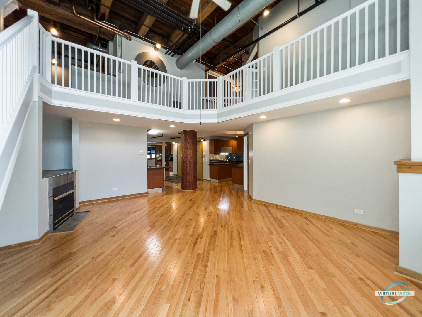 732 South Financial Place, Unit 104 Chicago, IL 60605 - Photo 11 of 30 a view of an empty room with wooden floor