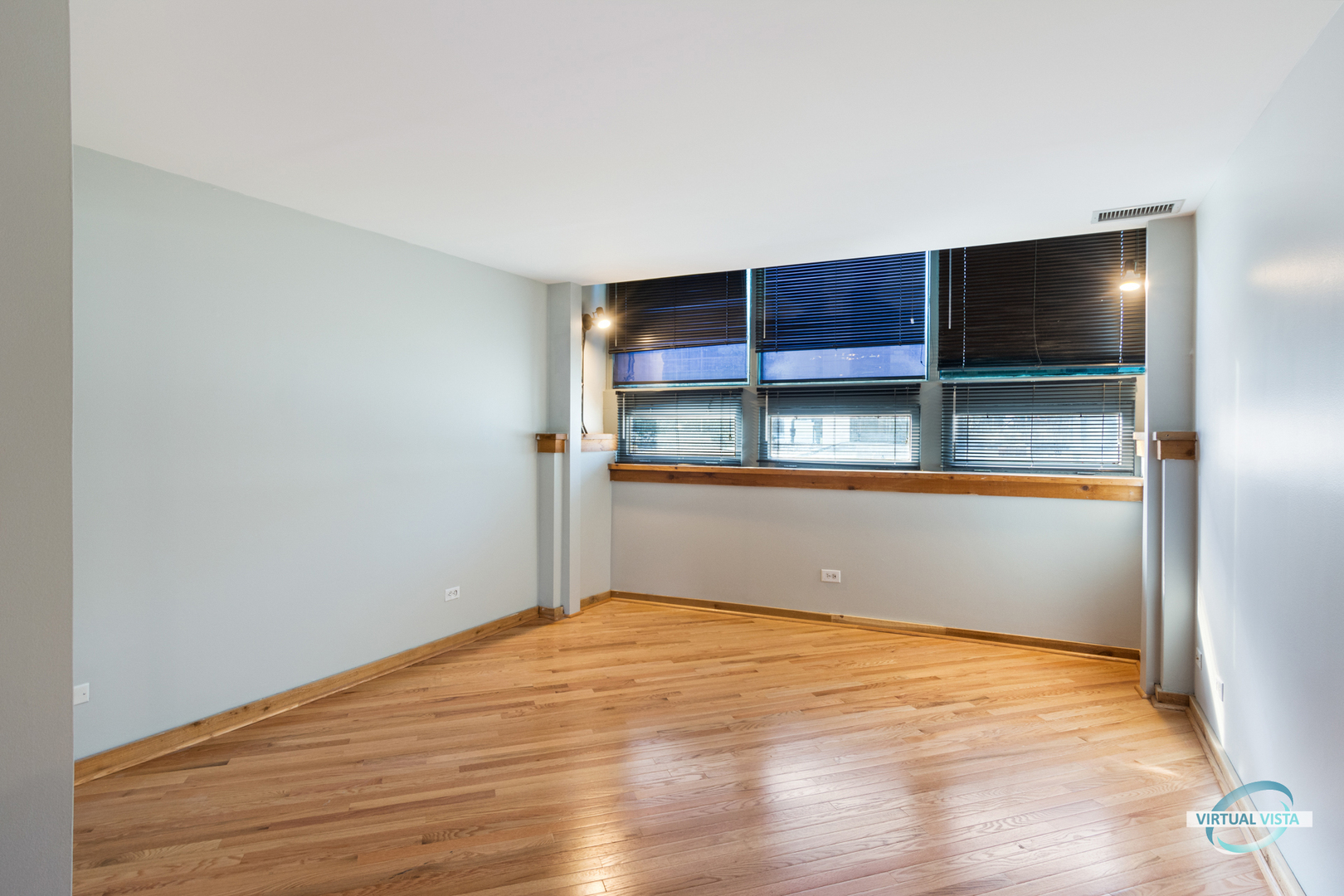 732 South Financial Place, Unit 104 Chicago, IL 60605 - Photo 15 of 30 a view of empty room with wooden floor