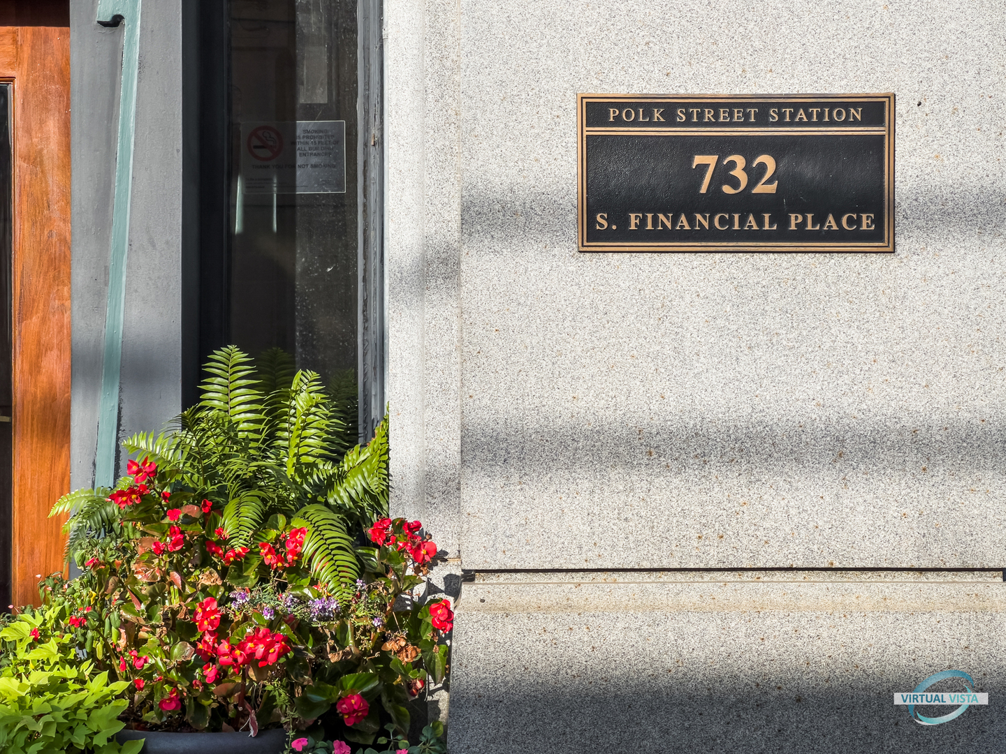 732 South Financial Place, Unit 104 Chicago, IL 60605 - Photo 26 of 30 a sign that is on the side of a building