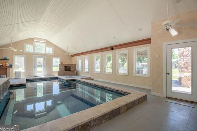 a front view of a house with garden and patio