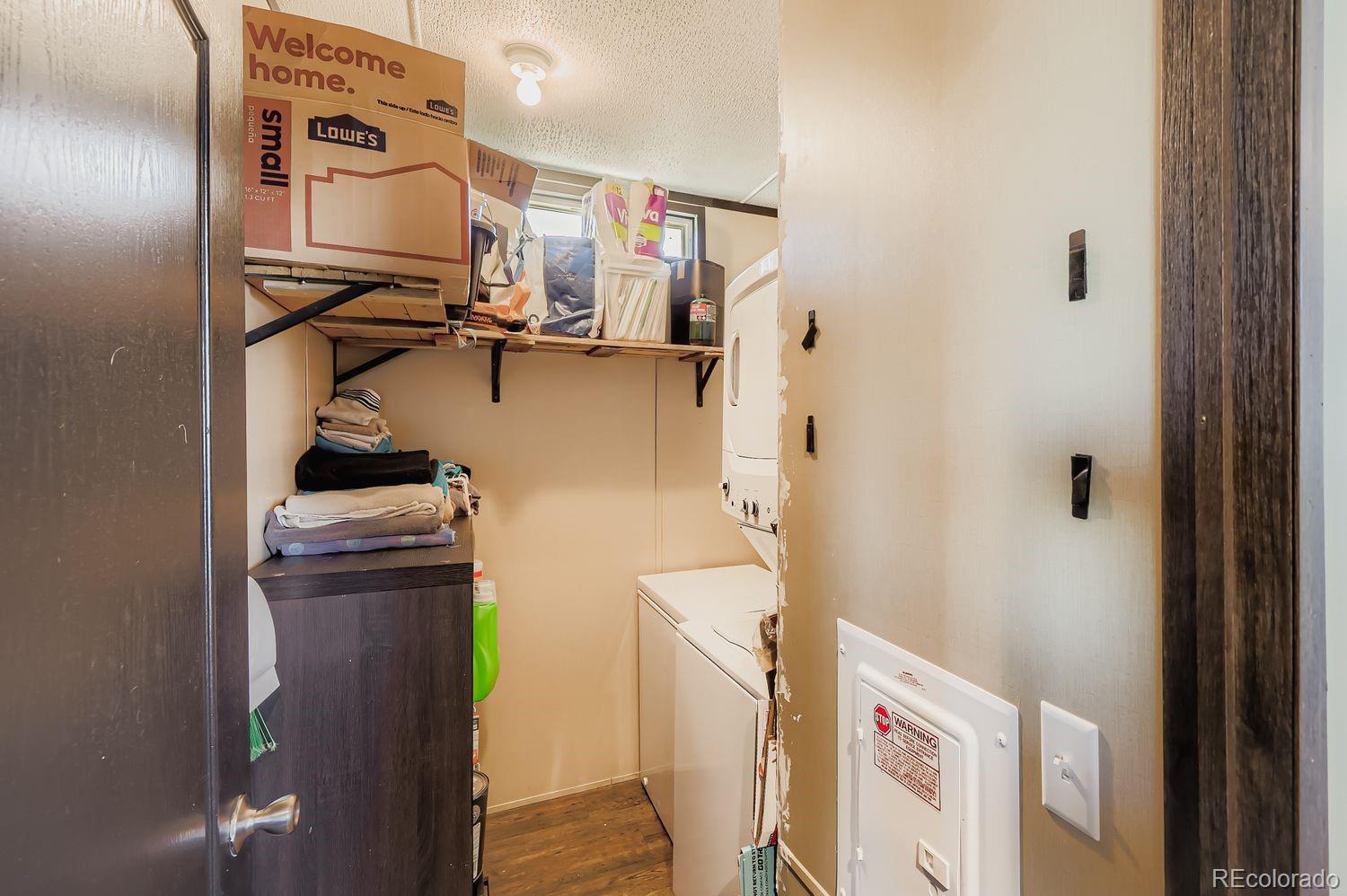 27604 Mucho Grande View Road Calhan, CO 80808 - Photo 14 of 16 a room with storage and utility