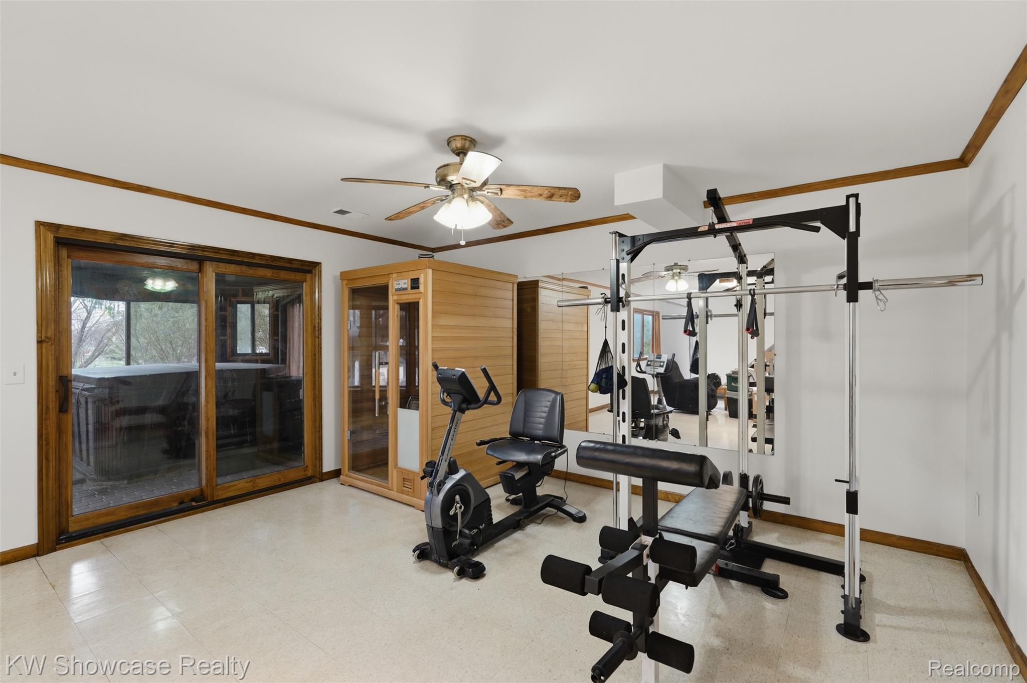 3330 Benstein Road Commerce Township, MI 48382 - Photo 17 of 40 LL Exercise area with a sauna (negotiable) w/ doorwall to sunroom w/ hot tub