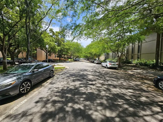 a park view with outdoor seating