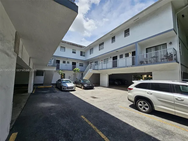 a view of a car in front of house