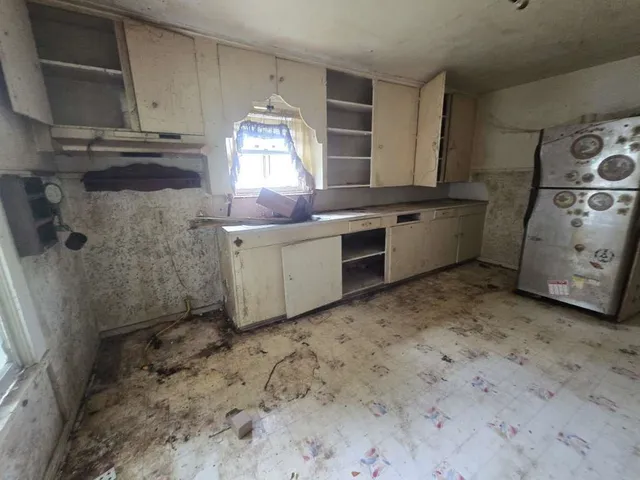 an empty room with windows