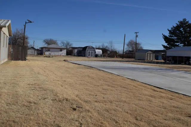 a view of a street with cars