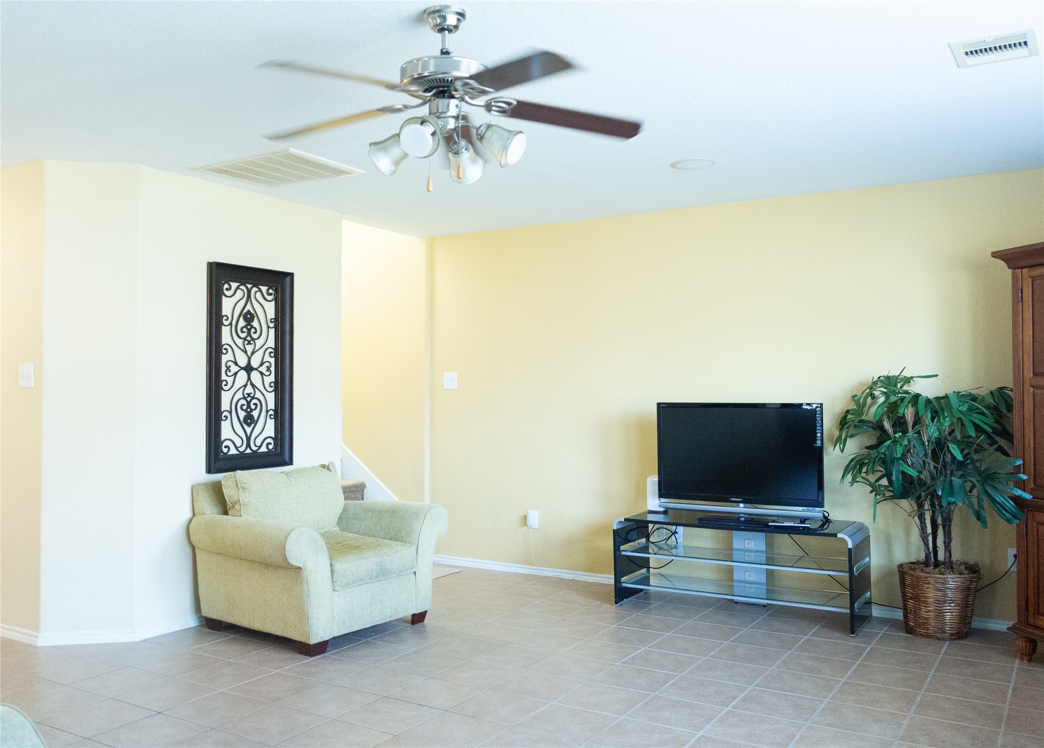 20403 Shire Ridge Lane Humble, TX 77338 - Photo 12 of 30 a living room with furniture and a flat screen tv