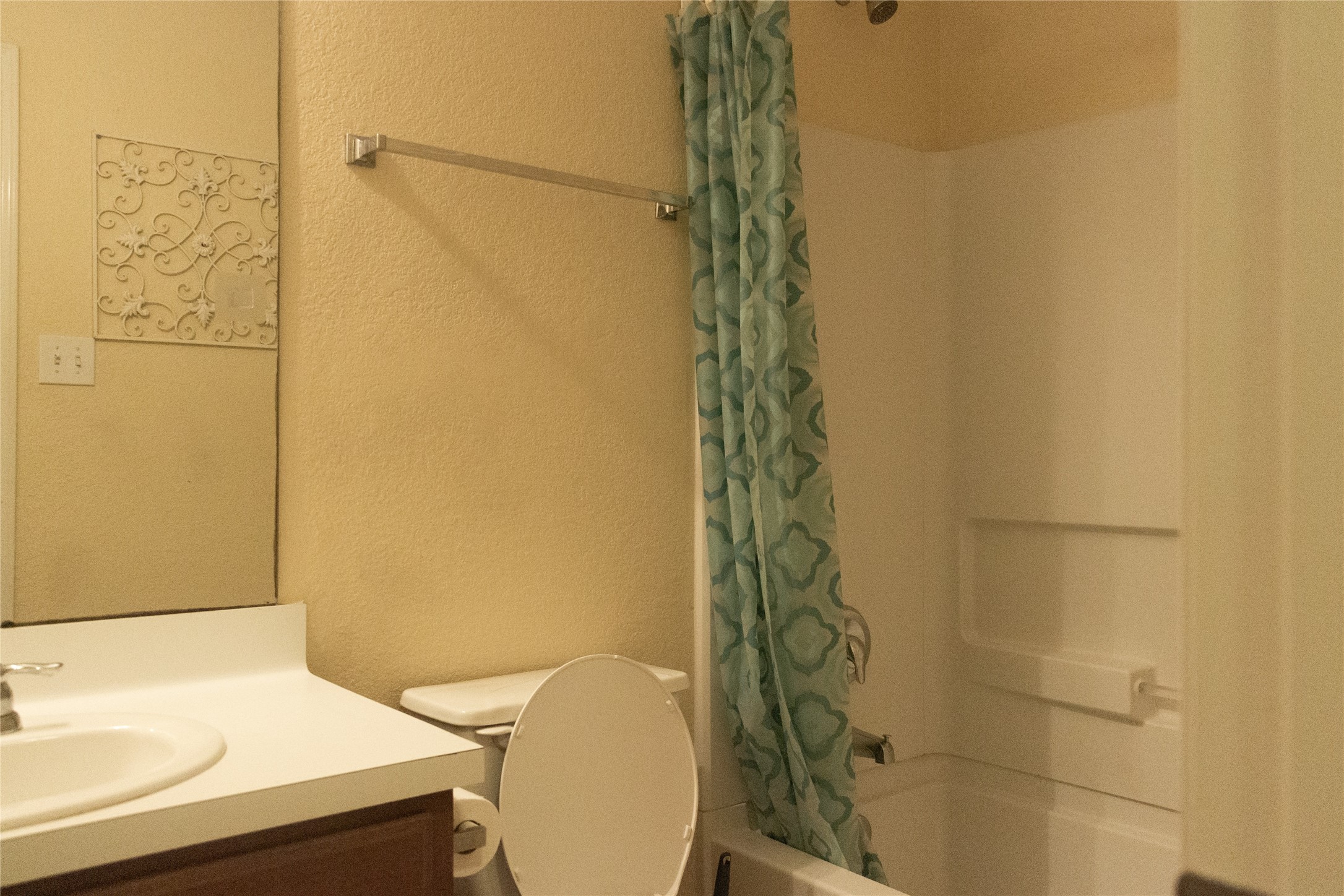20403 Shire Ridge Lane Humble, TX 77338 - Photo 22 of 30 a bathroom with a sink a toilet and shower