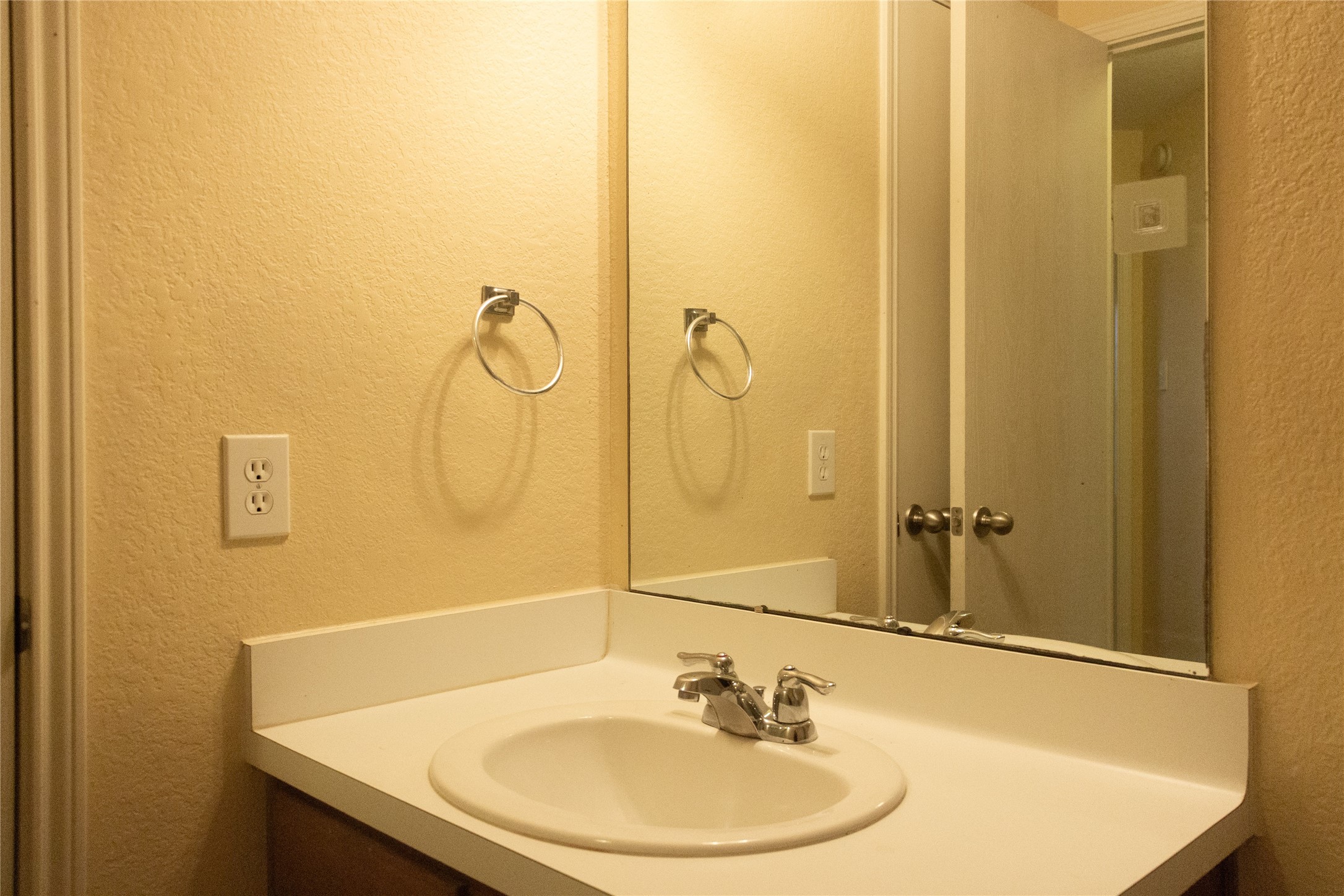 20403 Shire Ridge Lane Humble, TX 77338 - Photo 23 of 30 a bathroom with a sink and a mirror