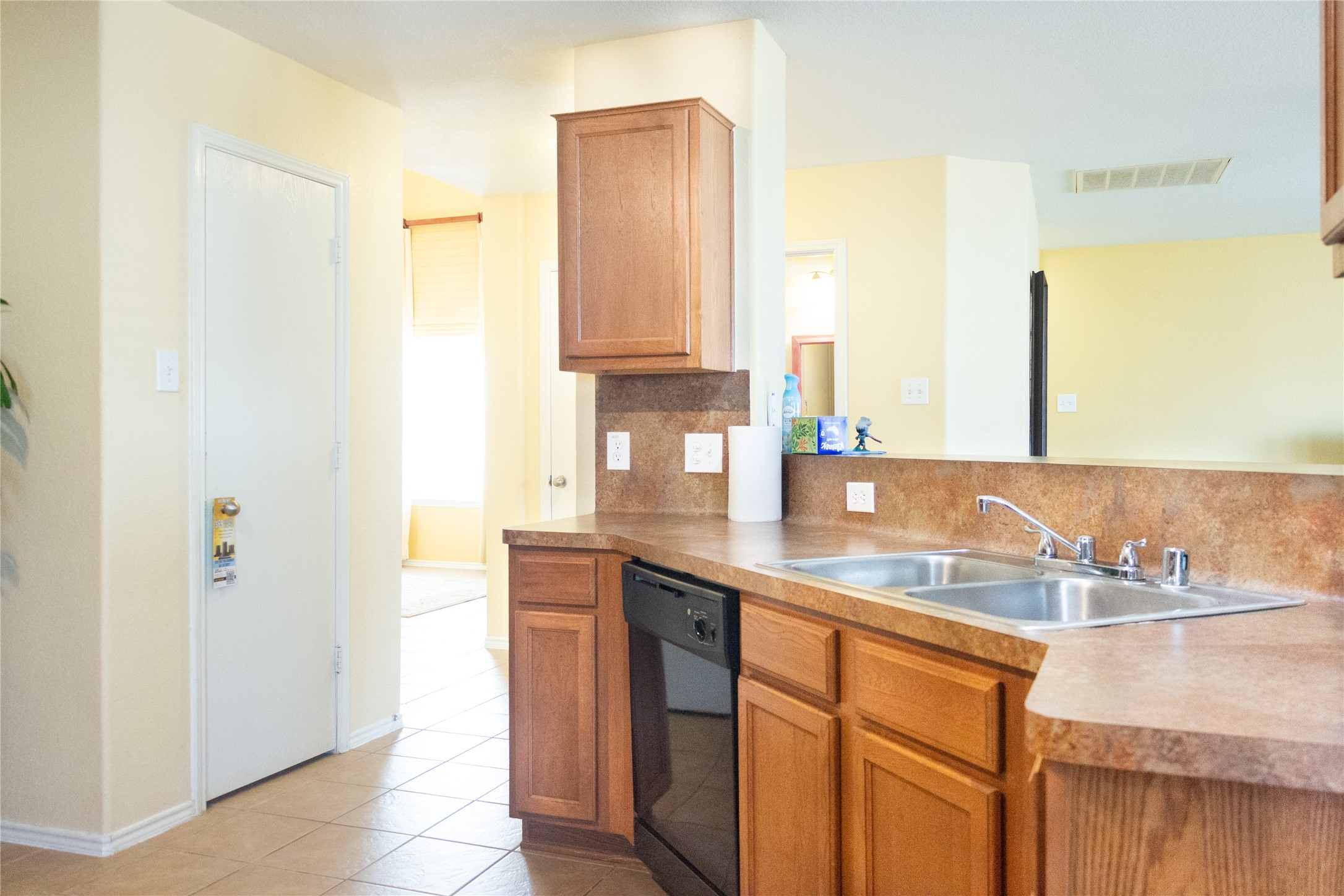 20403 Shire Ridge Lane Humble, TX 77338 - Photo 7 of 30 a kitchen with stainless steel appliances granite countertop a sink and a refrigerator