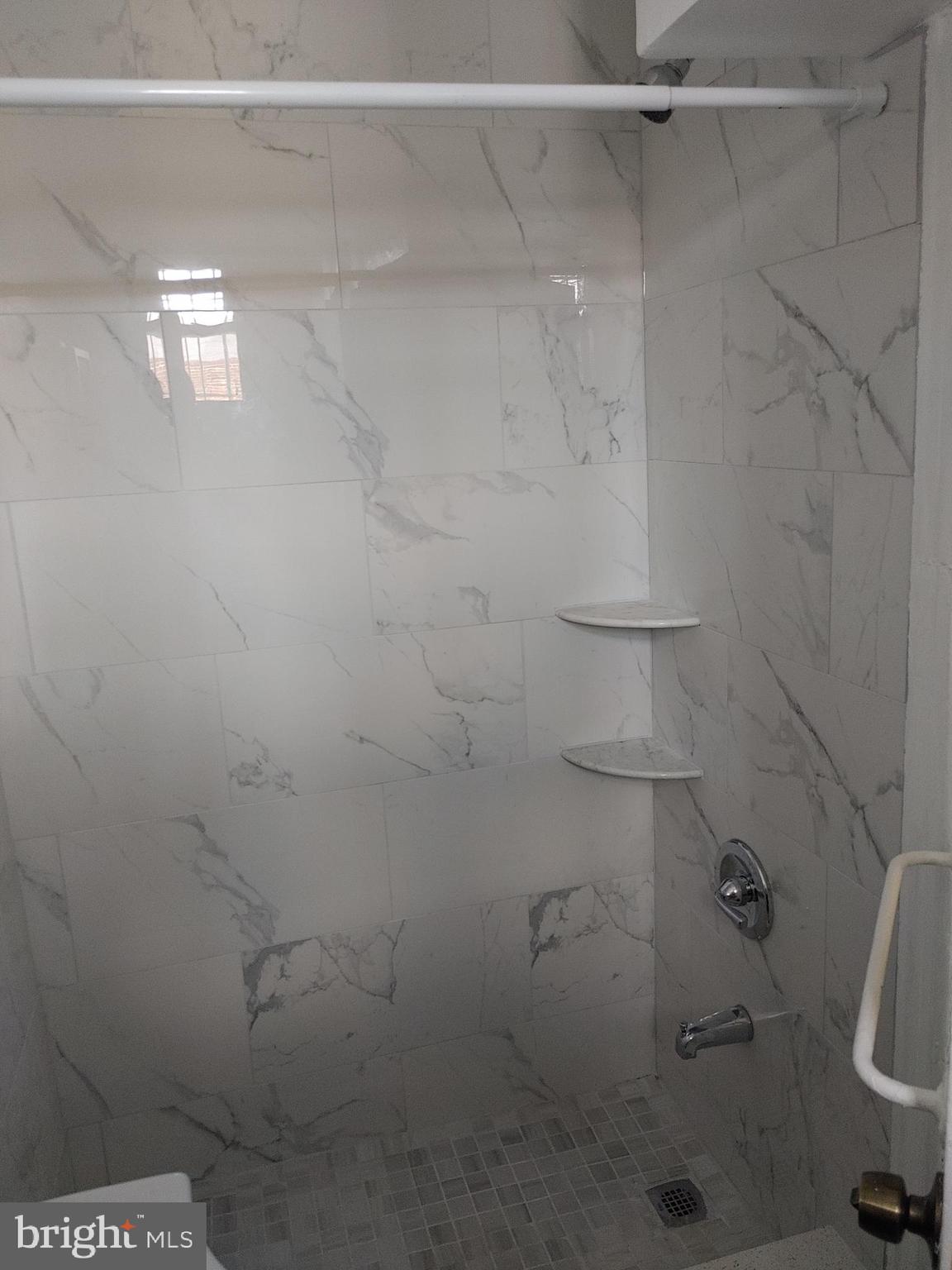 5917 Spruce Street, Unit 1 Philadelphia, PA 19139 - Photo 13 of 15 a bathroom with a shower