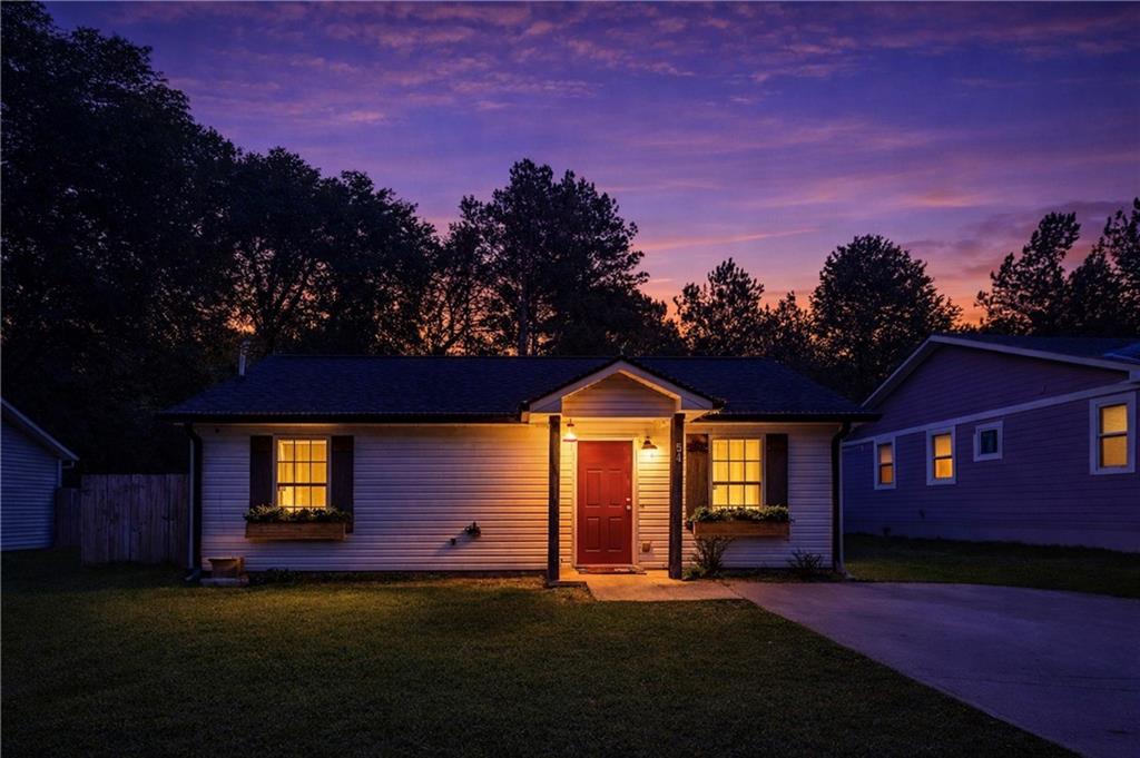 54 Taylorsville Road Aragon, GA 30104 - Photo 11 of 29 a front view of a house with a yard
