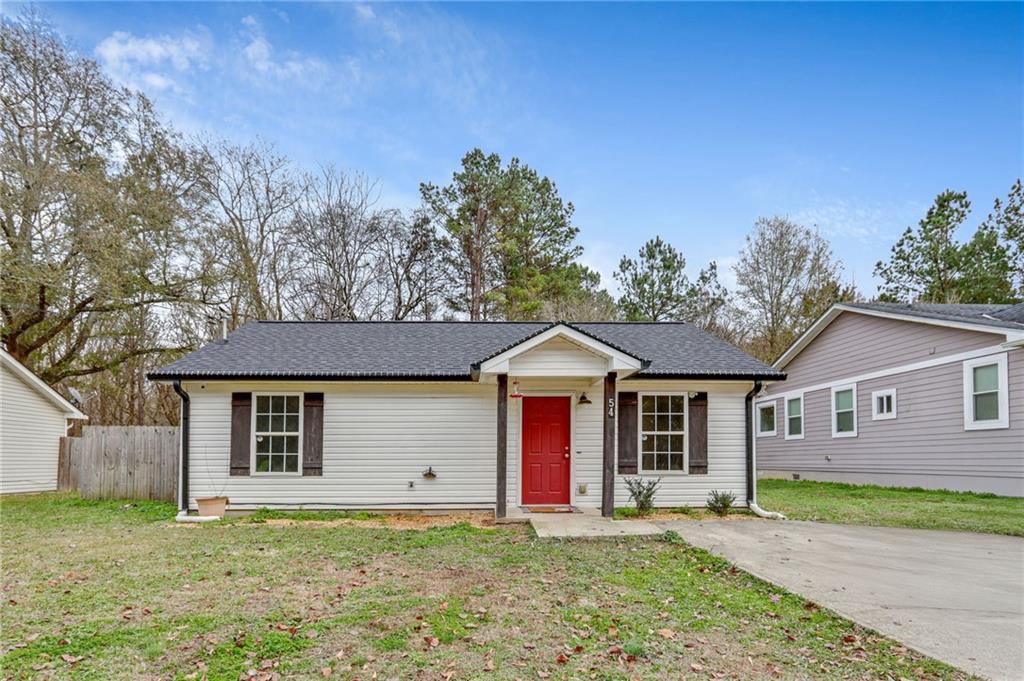 54 Taylorsville Road Aragon, GA 30104 - Photo 12 of 29 a front view of a house with a garden