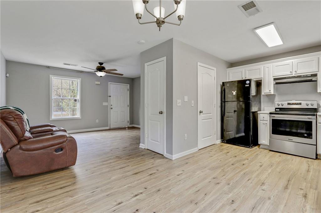 54 Taylorsville Road Aragon, GA 30104 - Photo 17 of 29 a spacious bedroom with a bed and furniture