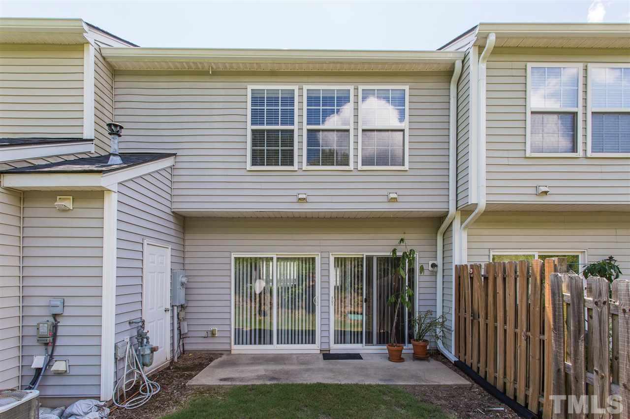 5117 Echo Ridge Road Raleigh, NC 27612 - Photo 22 of 27 a front view of a house with a porch