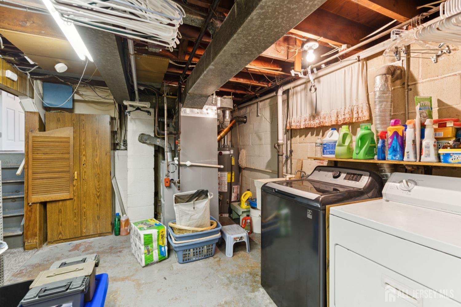 19 Overlook Terrace Fords, NJ 08863 - Photo 16 of 18 a utility room with dryer and washer