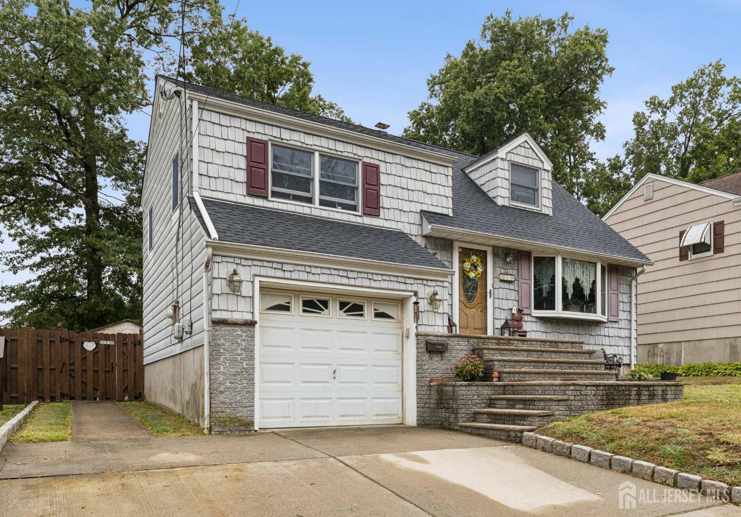19 Overlook Terrace Fords, NJ 08863 - Photo 2 of 18 a view of a house with a garage