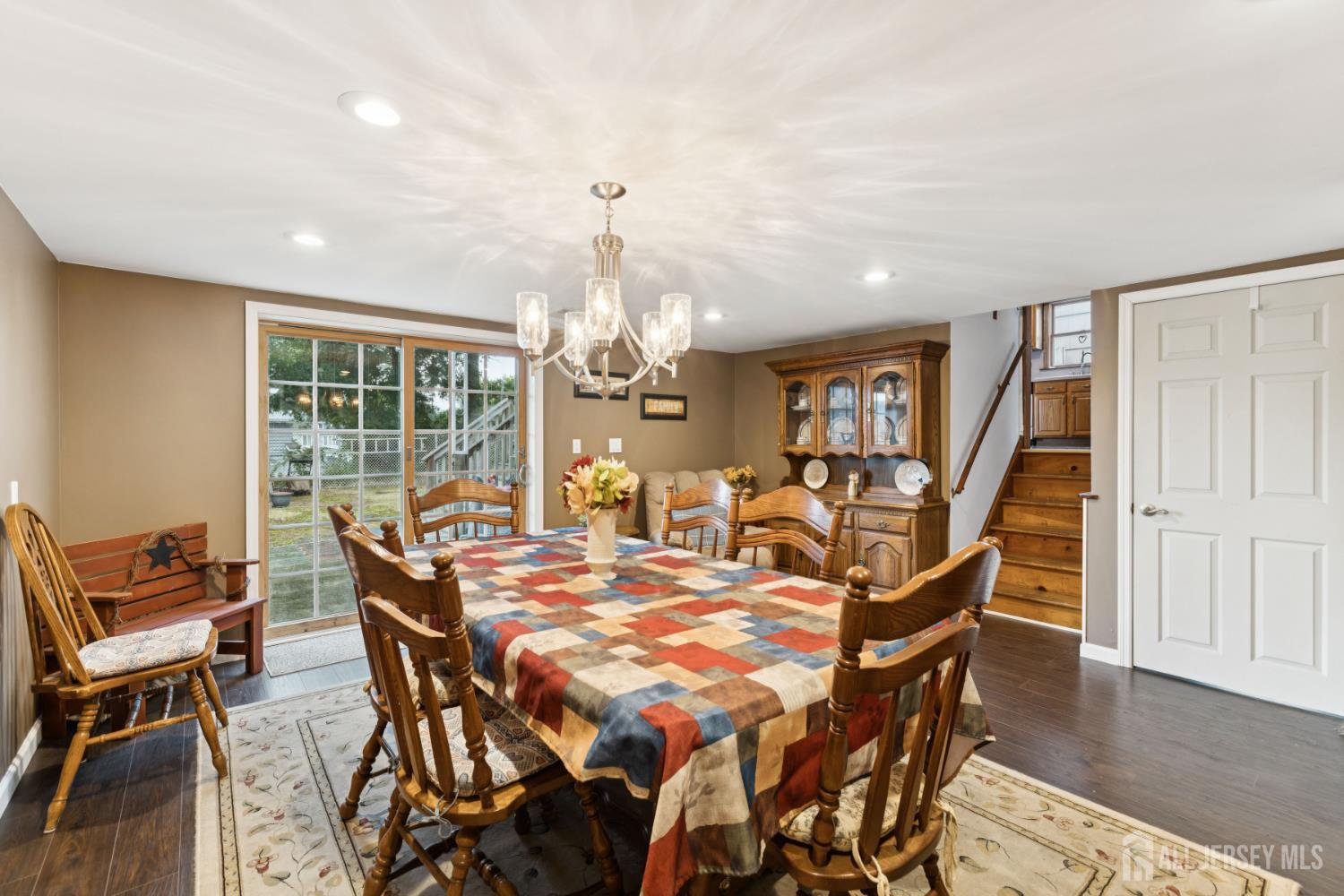 19 Overlook Terrace Fords, NJ 08863 - Photo 8 of 18 a view of a dining room with furniture wooden floor and chandelier