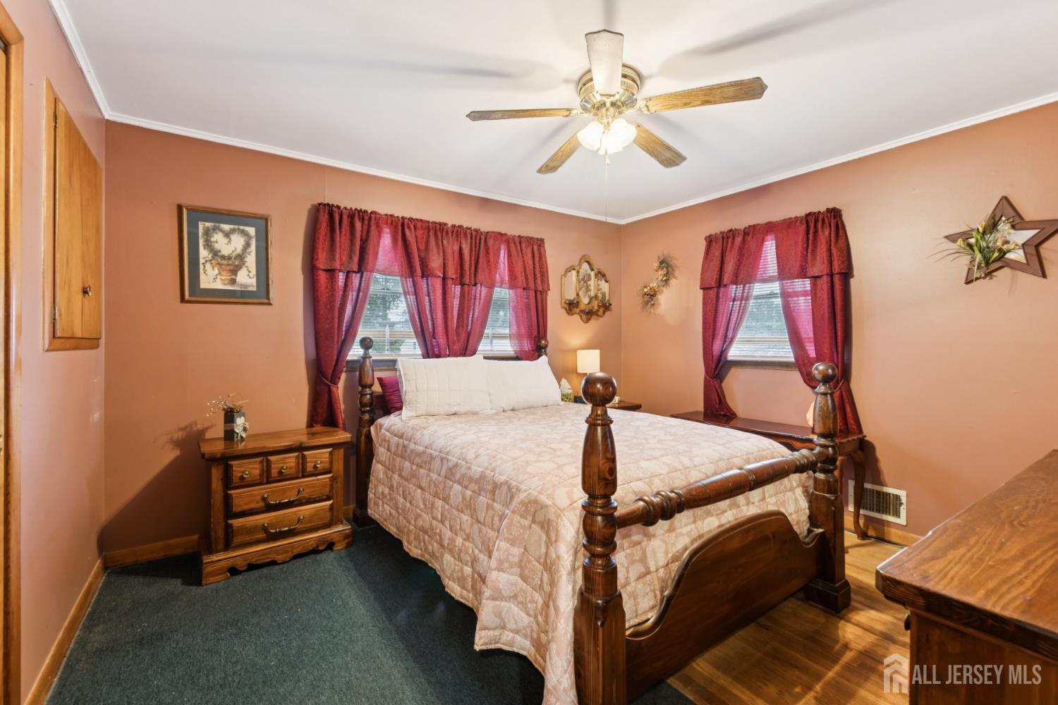 19 Overlook Terrace Fords, NJ 08863 - Photo 9 of 18 a bed room with a bed and a chandelier