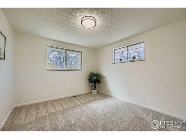 a view of an empty room with window