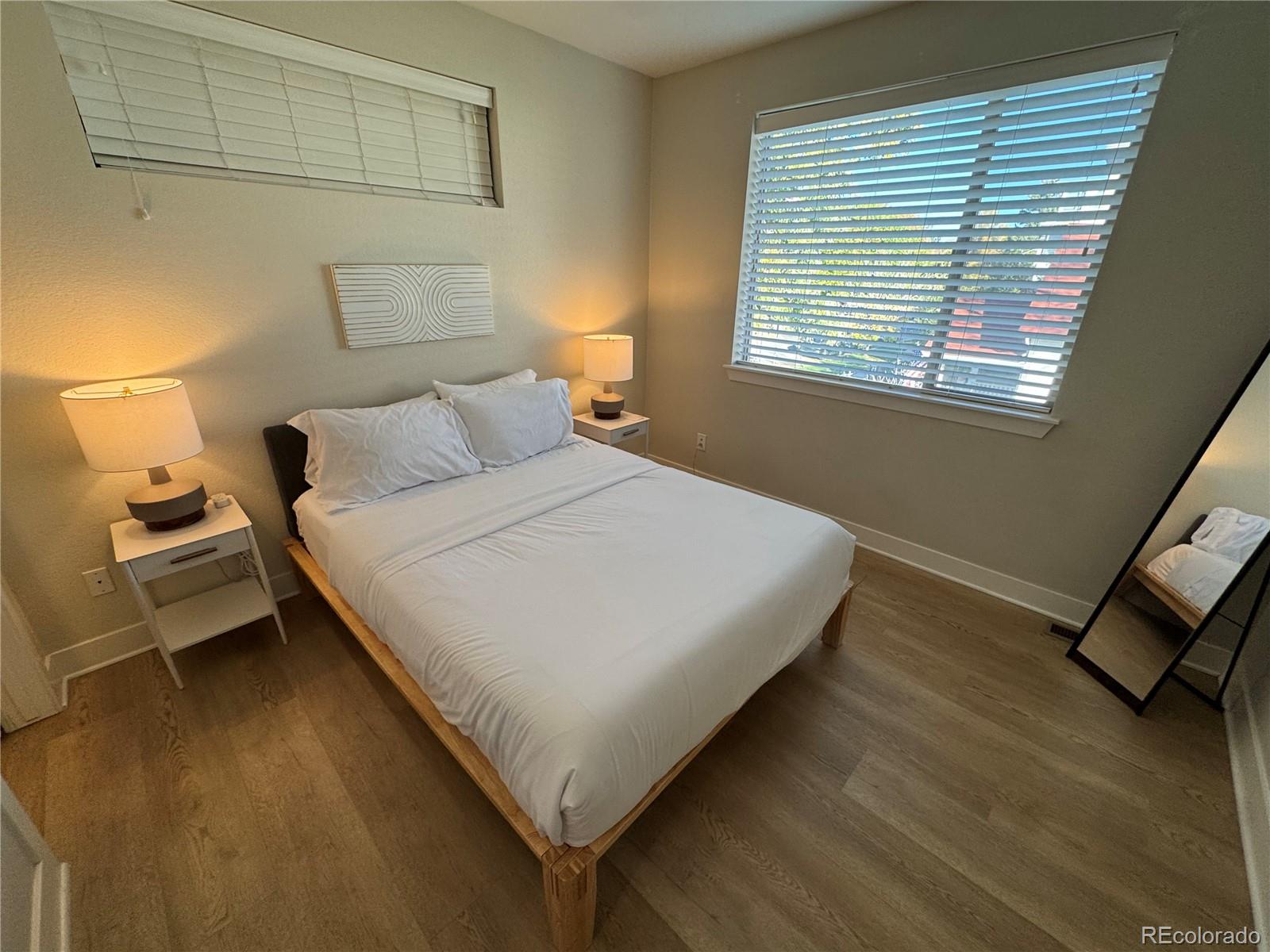 2124 Decatur Street Denver, CO 80211 - Photo 16 of 29 a bedroom with a bed and window