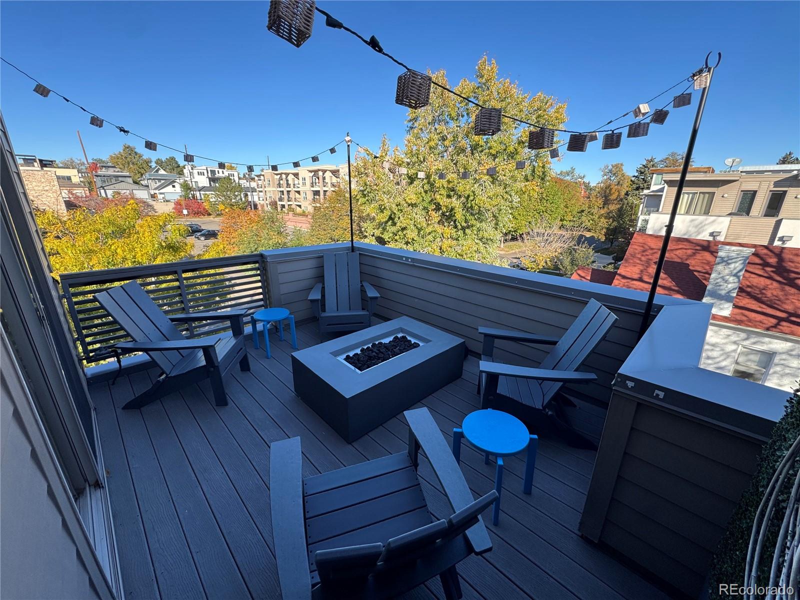 2124 Decatur Street Denver, CO 80211 - Photo 21 of 29 a view of a balcony with chair and wooden floor