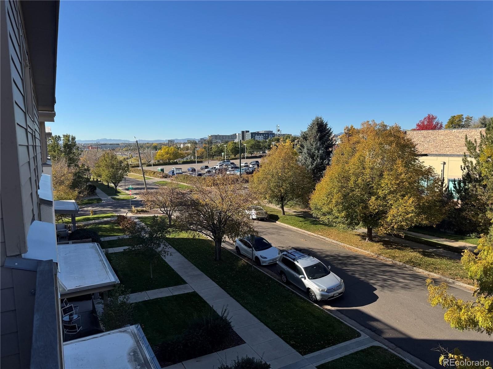 2124 Decatur Street Denver, CO 80211 - Photo 24 of 29 a view of a balcony with mountain view and wooden floor