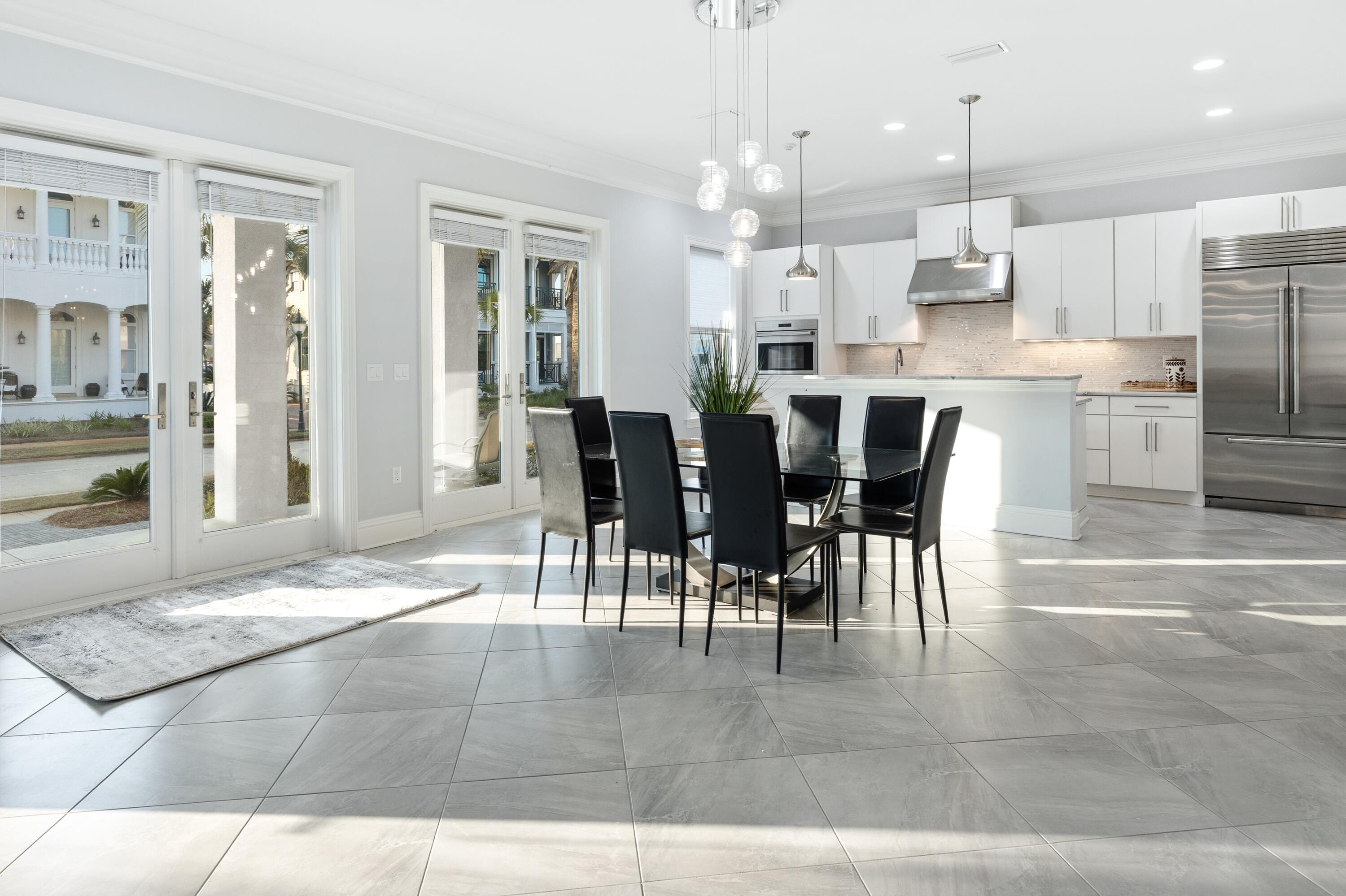 265 Rue Martine Miramar Beach, FL 32550 - Photo 12 of 82 a view of kitchen with dining area refrigerator and window