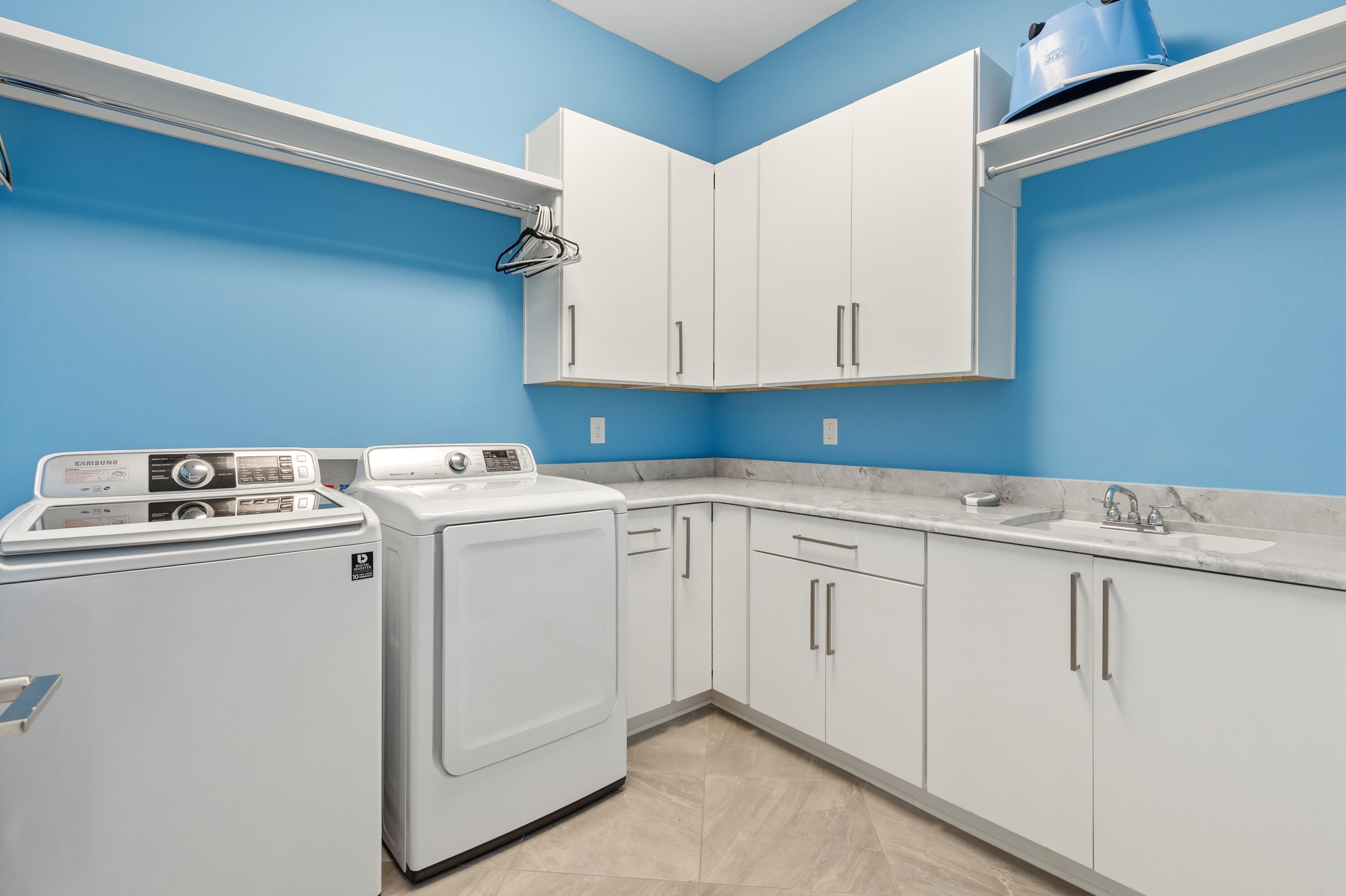 265 Rue Martine Miramar Beach, FL 32550 - Photo 20 of 82 a utility room with dryer and washer
