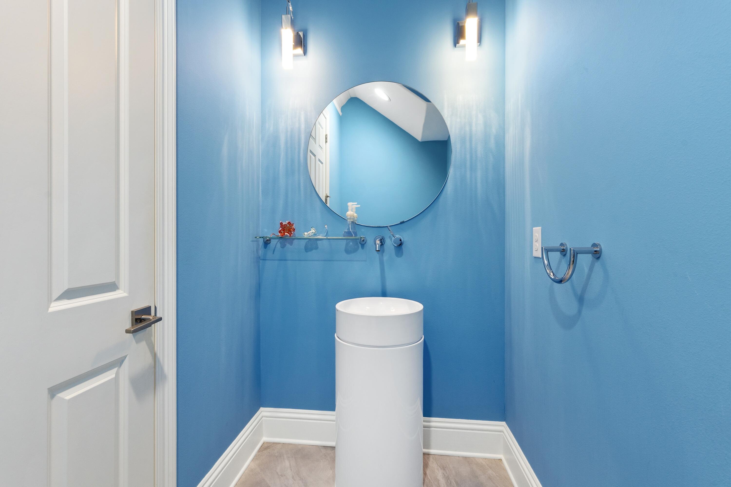 265 Rue Martine Miramar Beach, FL 32550 - Photo 21 of 82 a bathroom with a toilet and a mirror