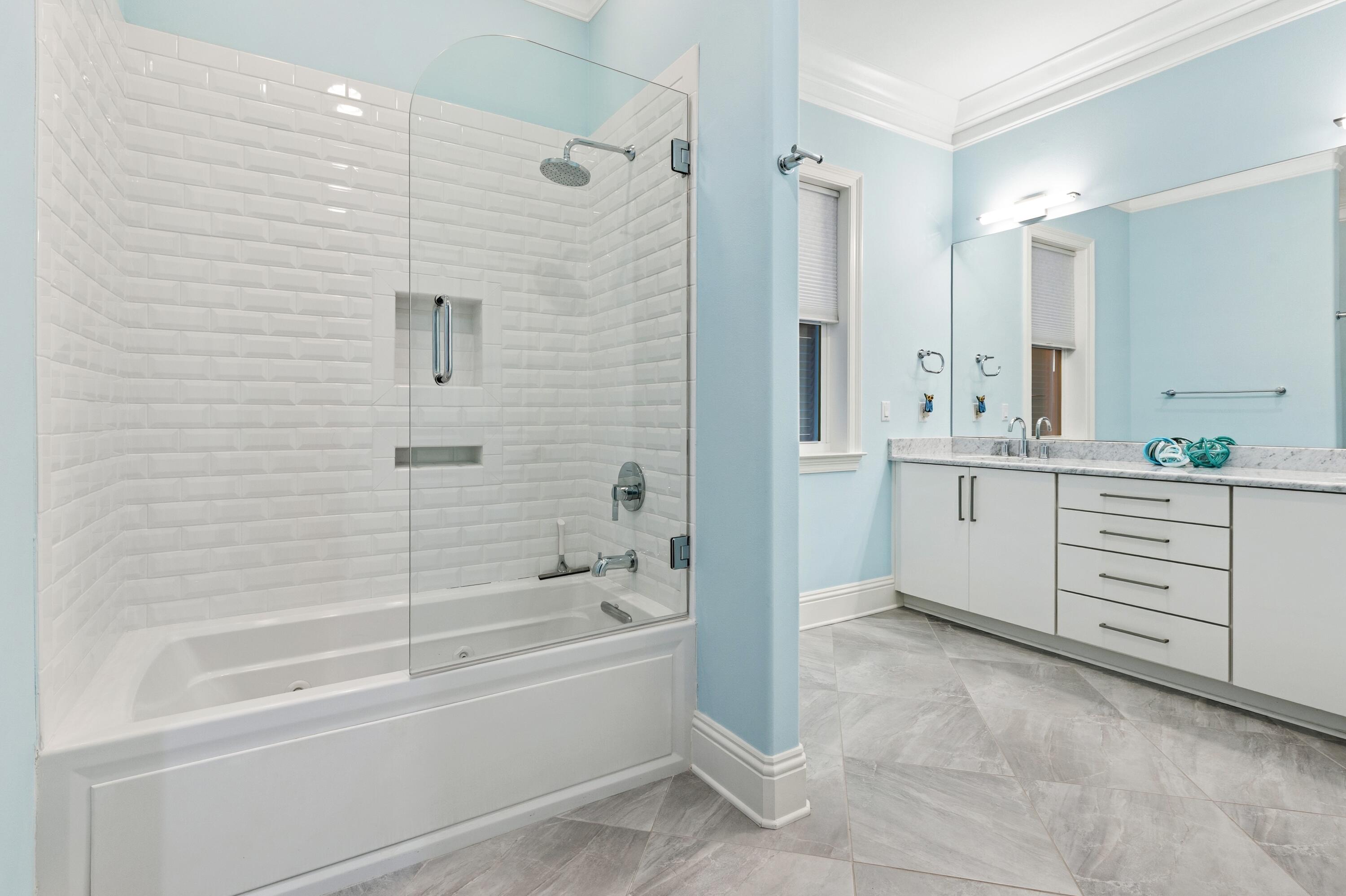 265 Rue Martine Miramar Beach, FL 32550 - Photo 24 of 82 a bathroom with a bathtub sink and toilet