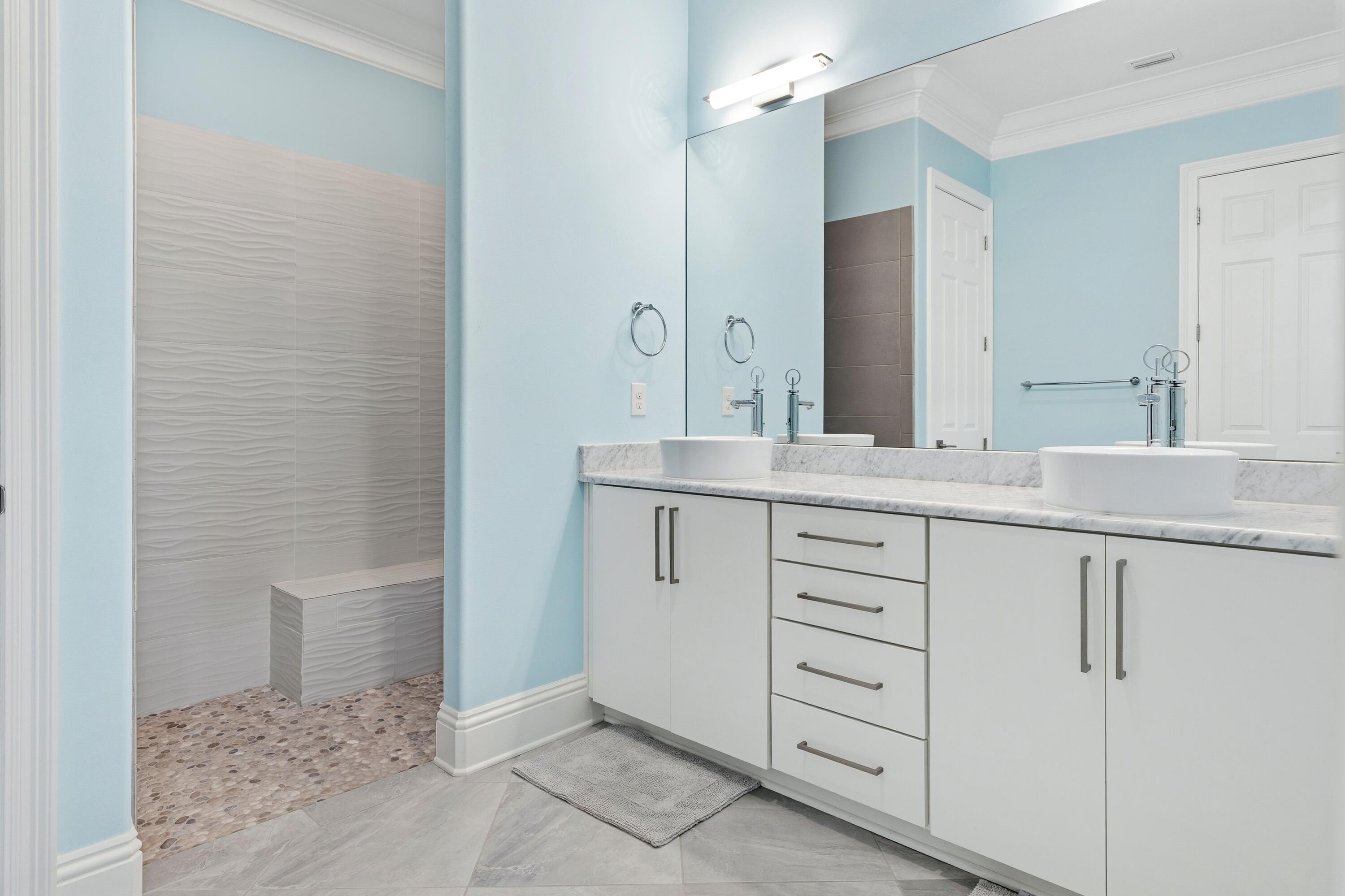 265 Rue Martine Miramar Beach, FL 32550 - Photo 27 of 82 a bathroom with a granite countertop sink and a mirror
