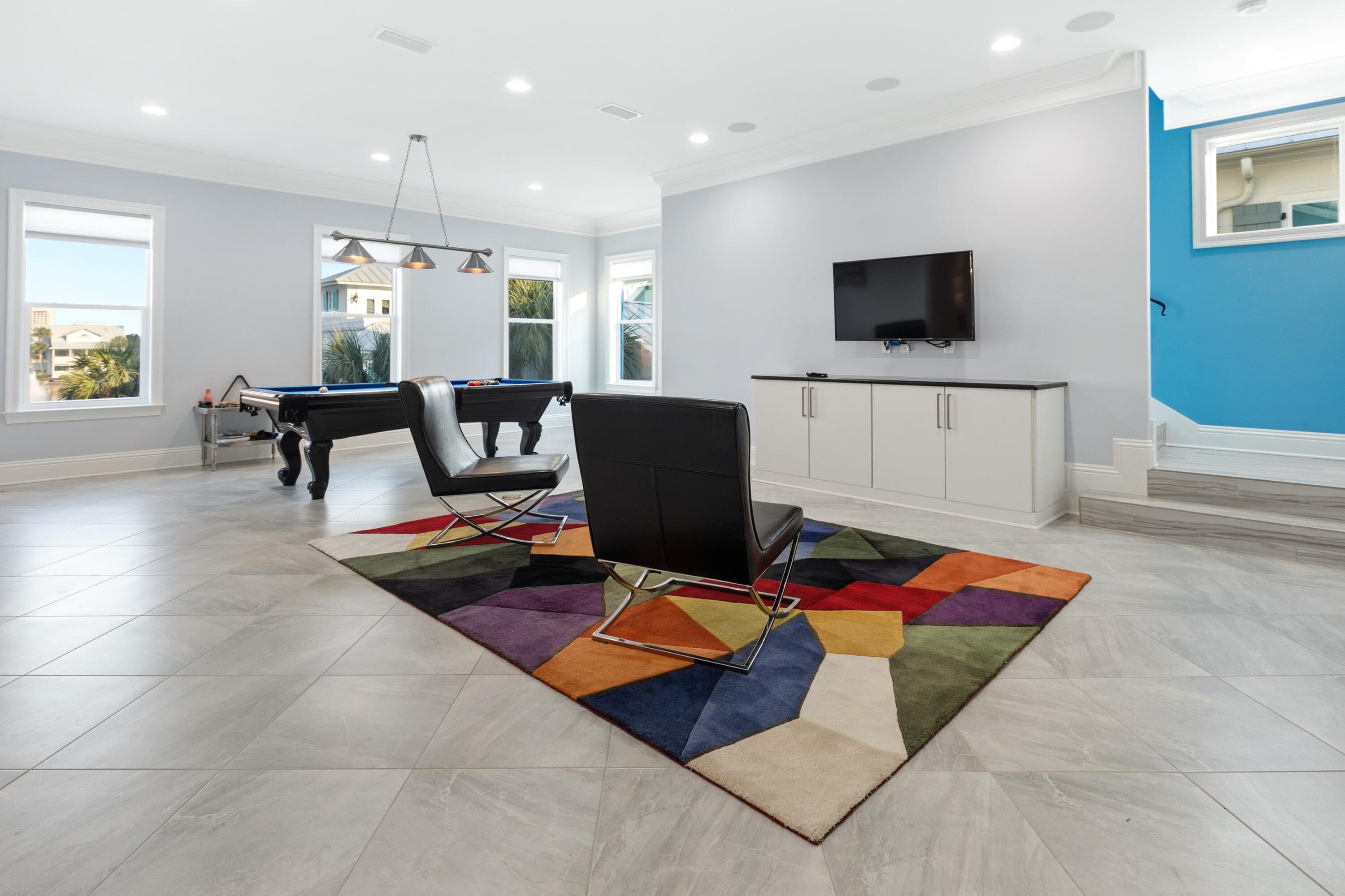 265 Rue Martine Miramar Beach, FL 32550 - Photo 34 of 82 a living room with furniture and a flat screen tv