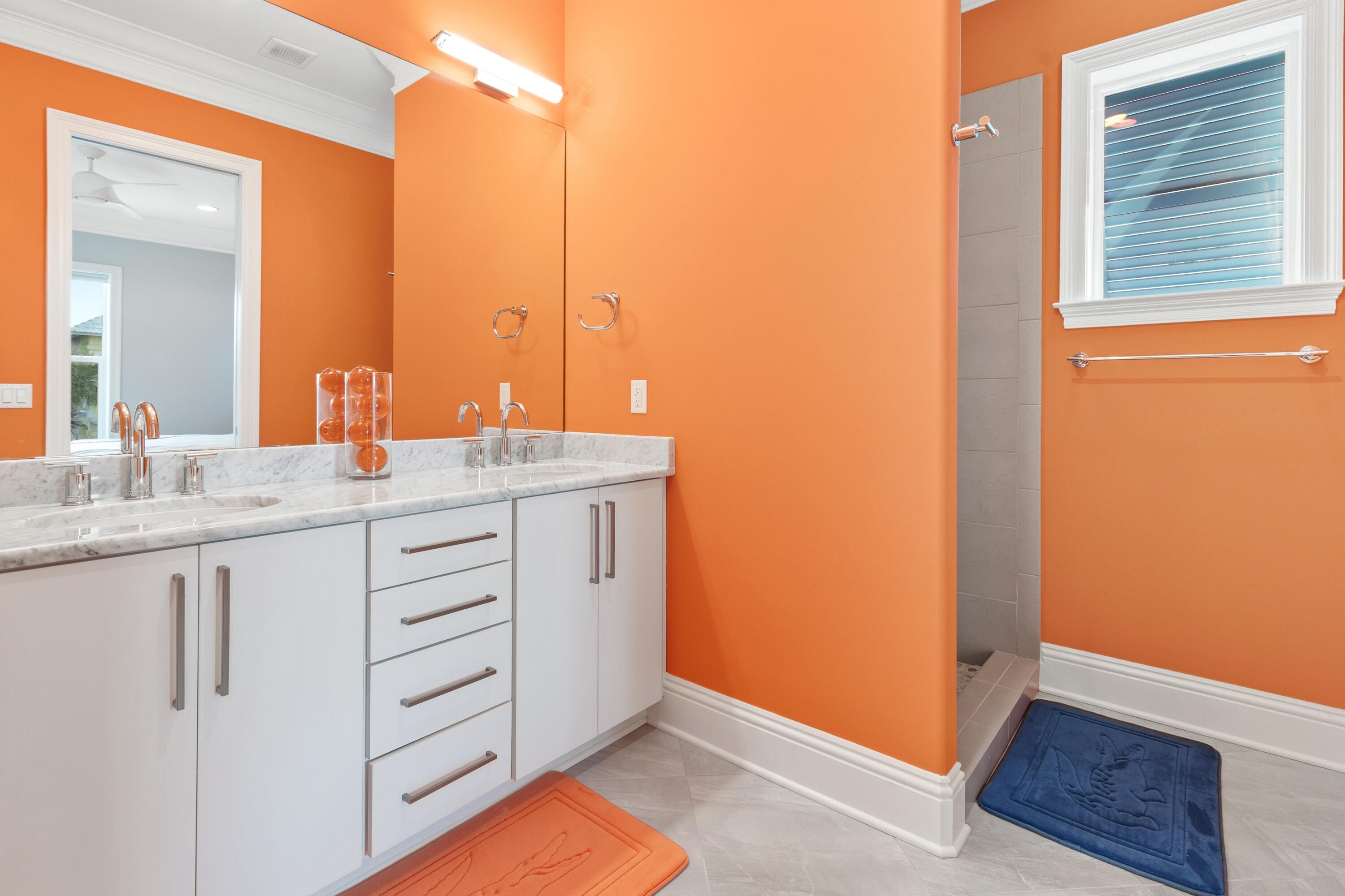 265 Rue Martine Miramar Beach, FL 32550 - Photo 45 of 82 a bathroom with a sink and a mirror