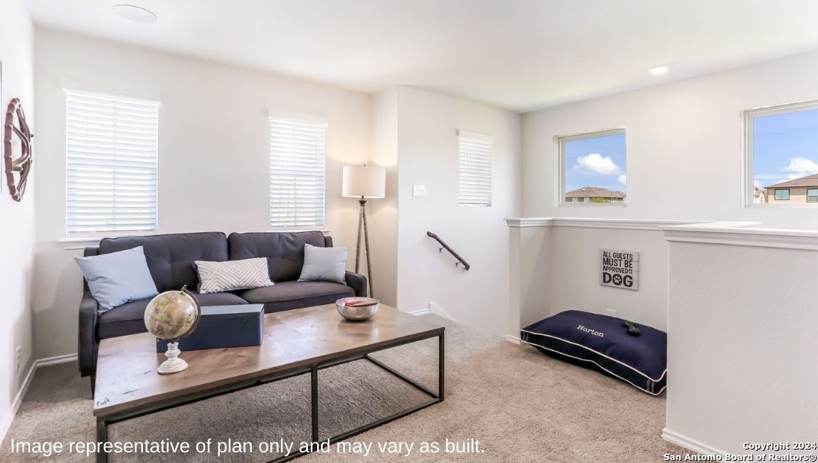 14782 Clay Rdg Run San Antonio, TX 78253 - Photo 17 of 68 a living room with furniture and a window