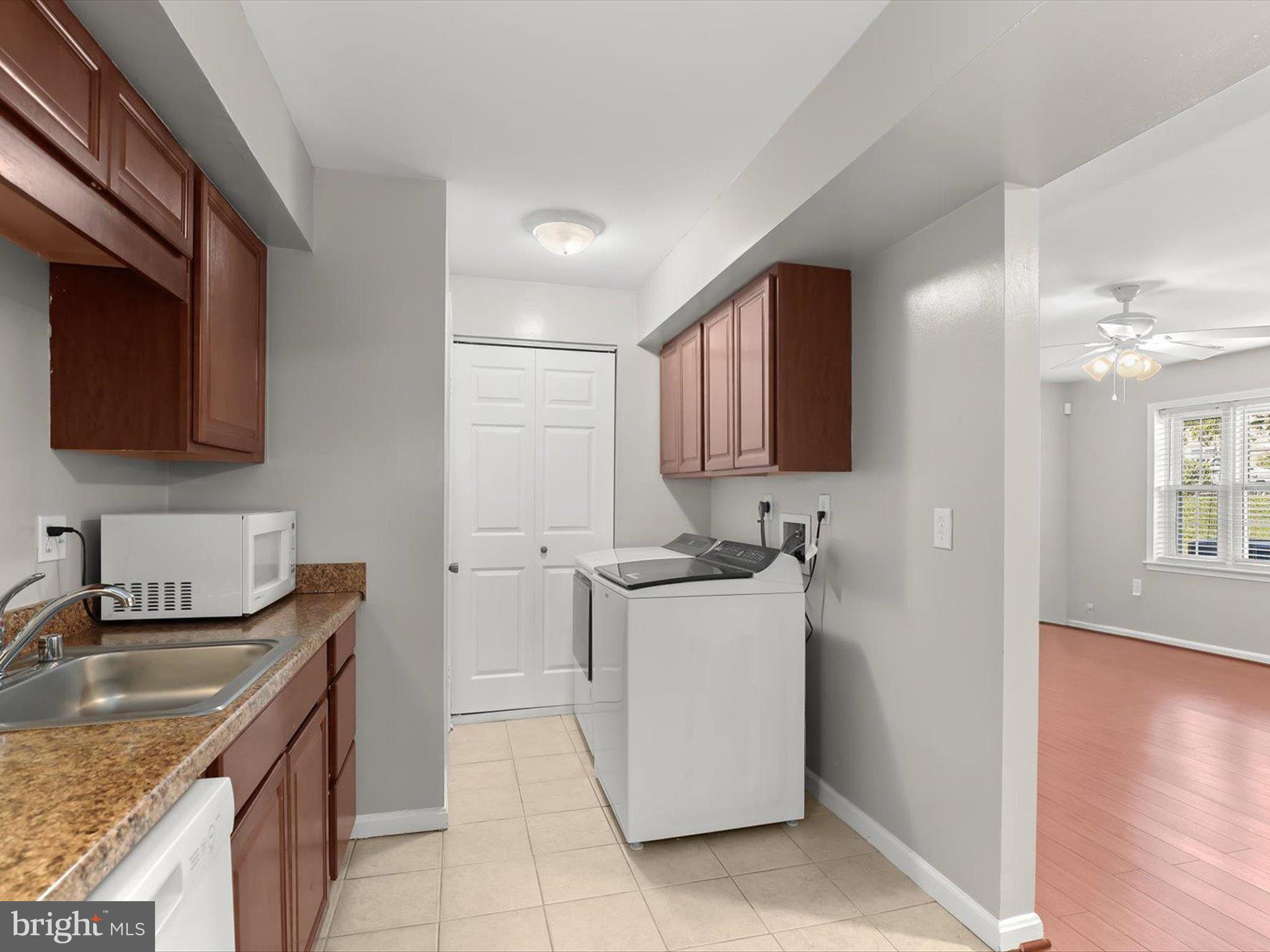 9075 North Laurel Road, Unit G Laurel, MD 20723 - Photo 7 of 28 Living Room and Kitchen