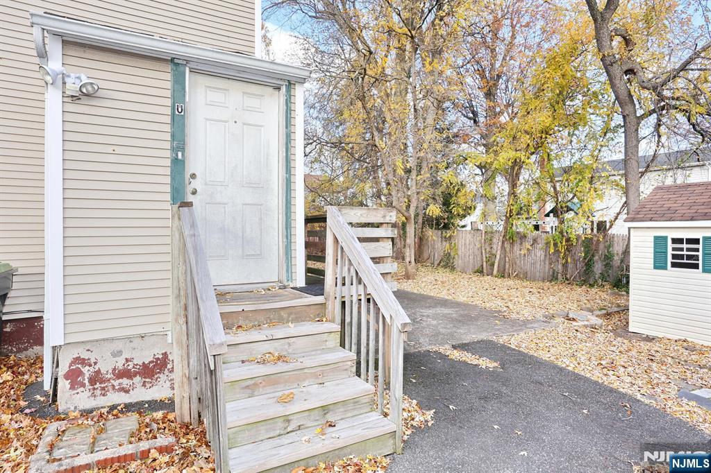 325 New Bridge Road Bergenfield, NJ 07621 - Photo 18 of 50 a view of a entrance with a house