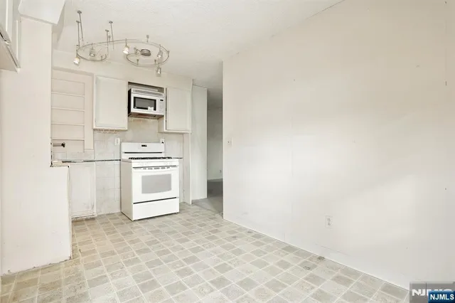 a view of an entryway with hallway