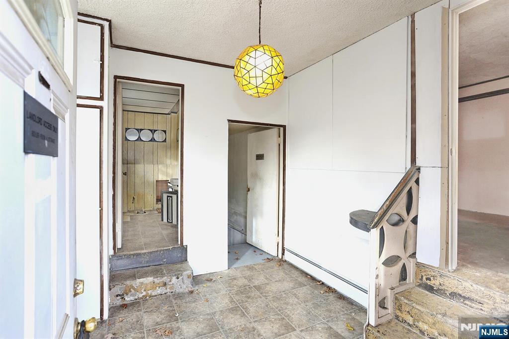 325 New Bridge Road Bergenfield, NJ 07621 - Photo 37 of 50 a view of an entryway with hallway