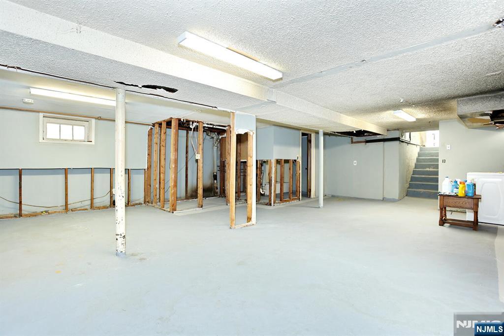 325 New Bridge Road Bergenfield, NJ 07621 - Photo 43 of 50 a view of a room with gym equipment