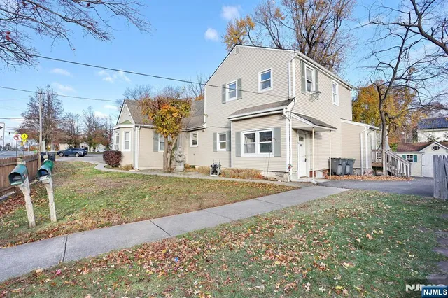a house view with a backyard