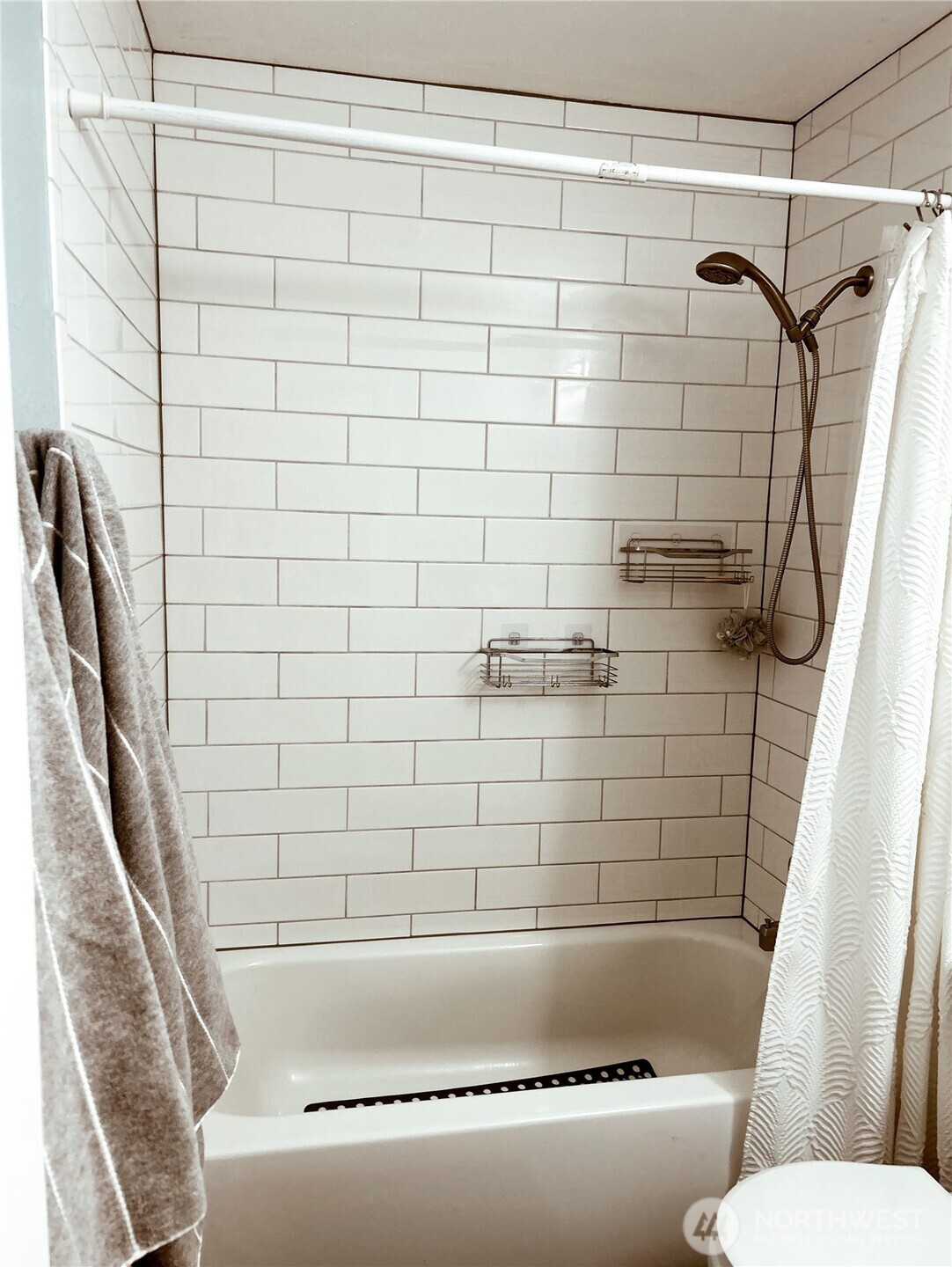 336 Harvard Avenue Fircrest, WA 98466 - Photo 9 of 17 a bathroom with a shower and a toilet