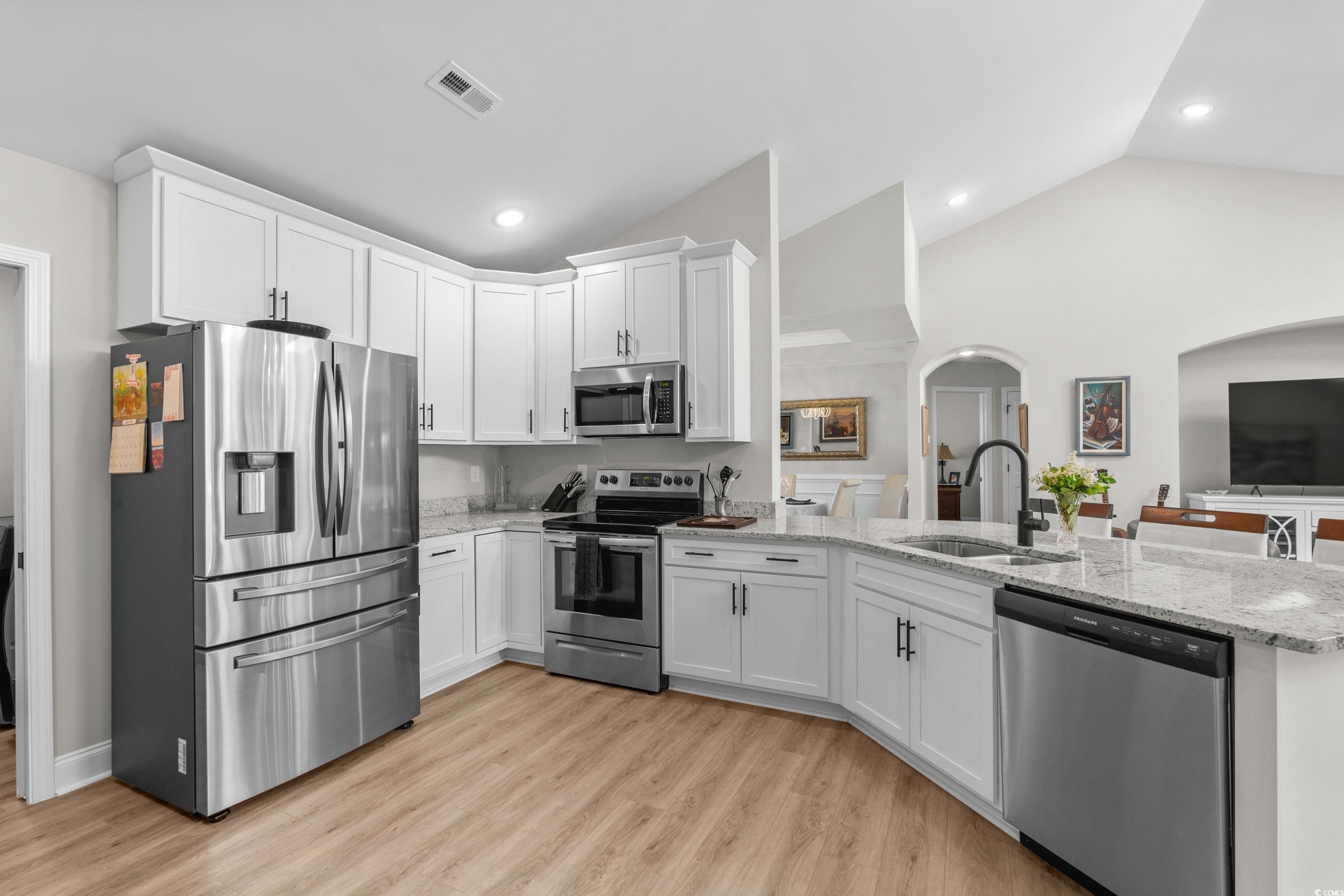 370 Foxtail Drive Longs, SC 29568 - Photo 12 of 40 Kitchen featuring visible vents, arched walkways,