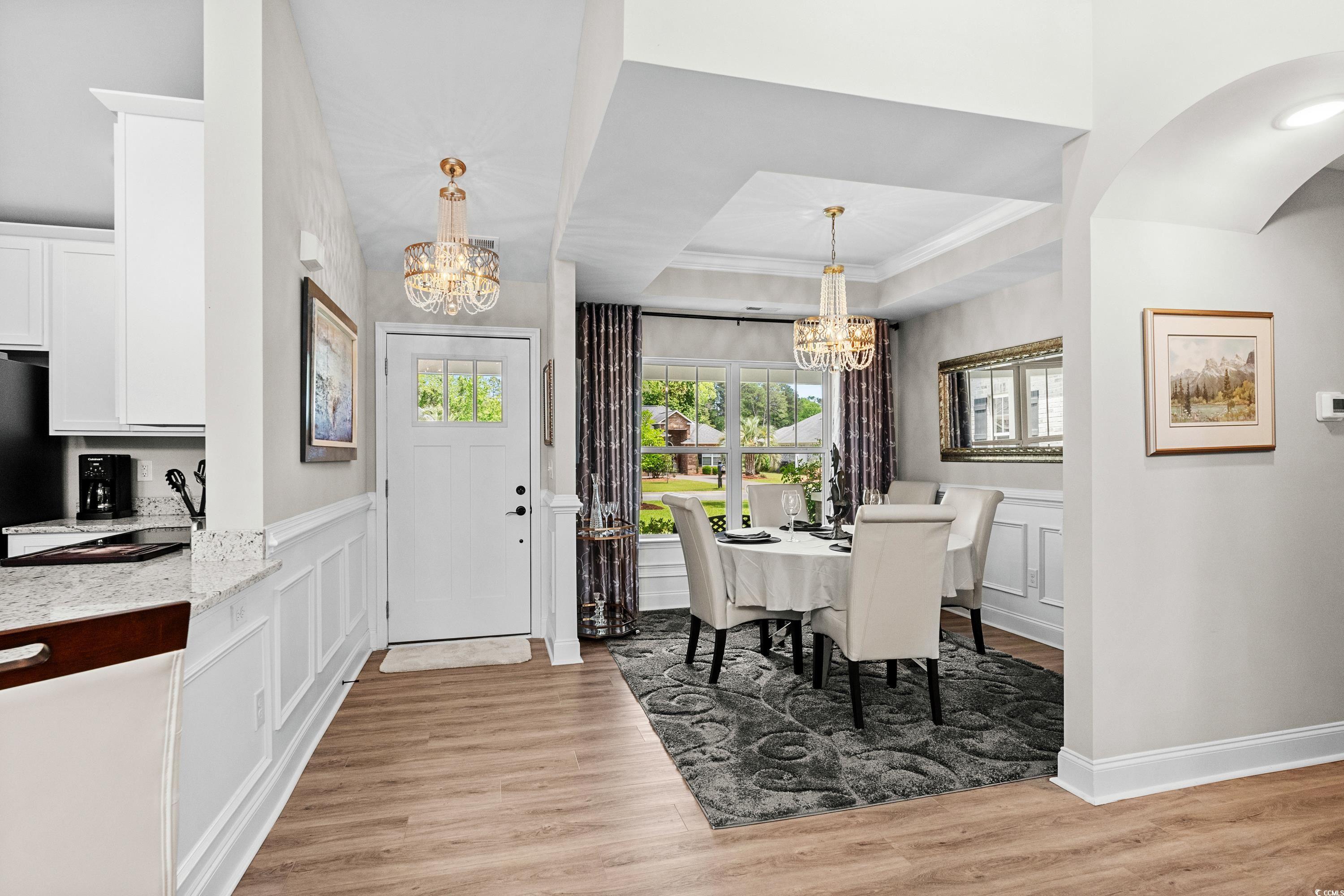 370 Foxtail Drive Longs, SC 29568 - Photo 15 of 40 Dining space featuring a tray ceiling, an inviting