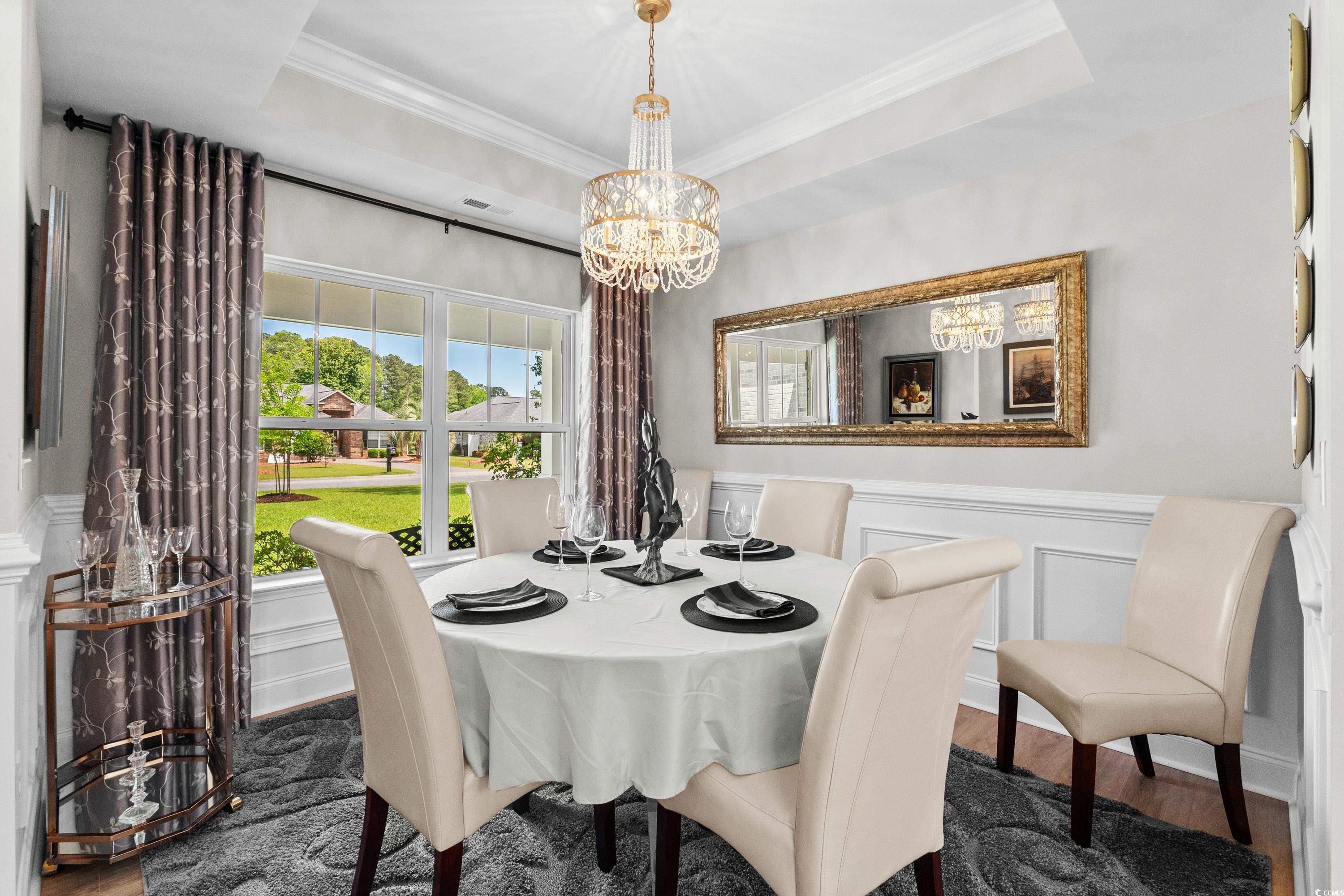 370 Foxtail Drive Longs, SC 29568 - Photo 16 of 40 Dining space featuring an inviting chandelier, orn
