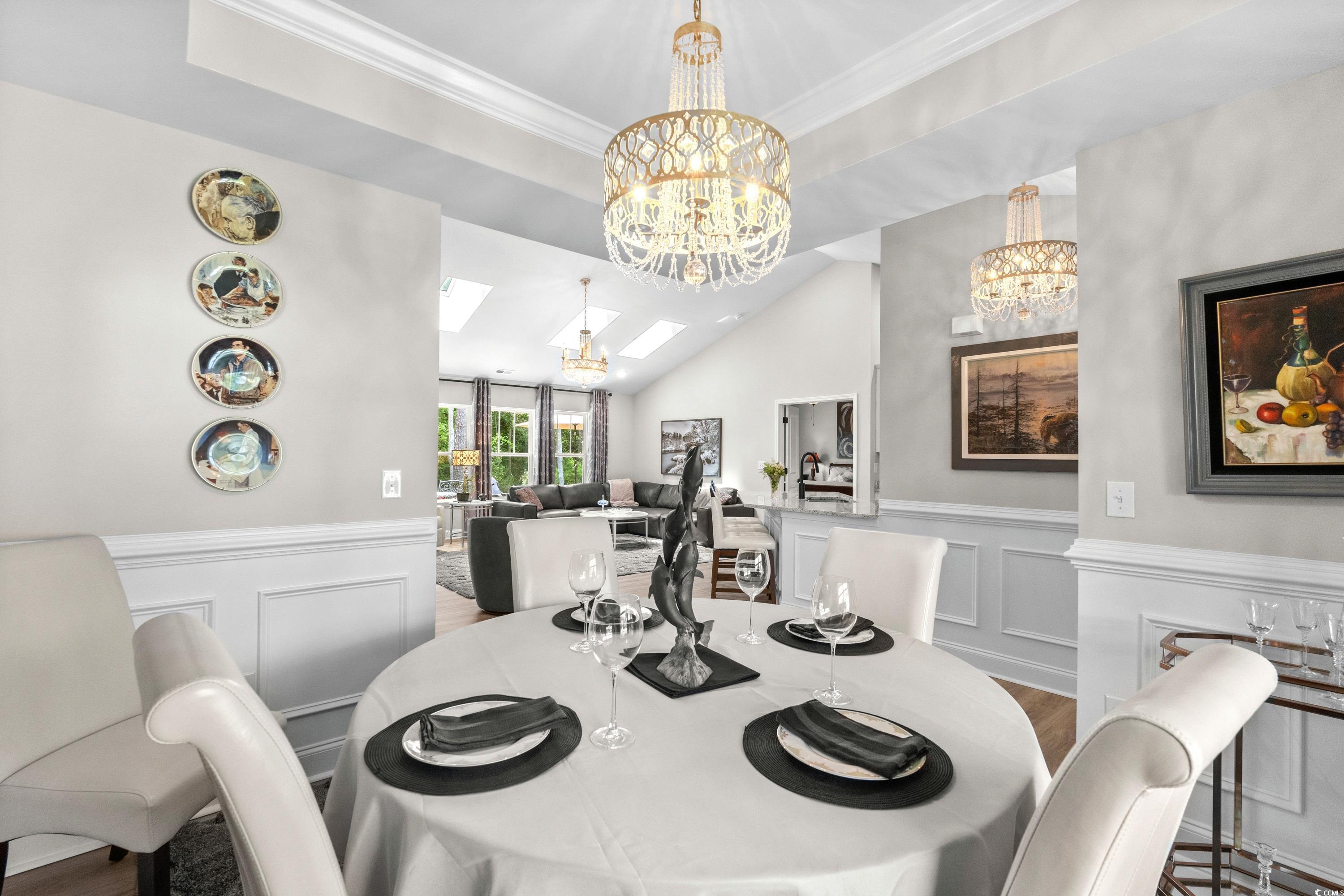 370 Foxtail Drive Longs, SC 29568 - Photo 17 of 40 Dining area with a decorative wall, wainscoting, w