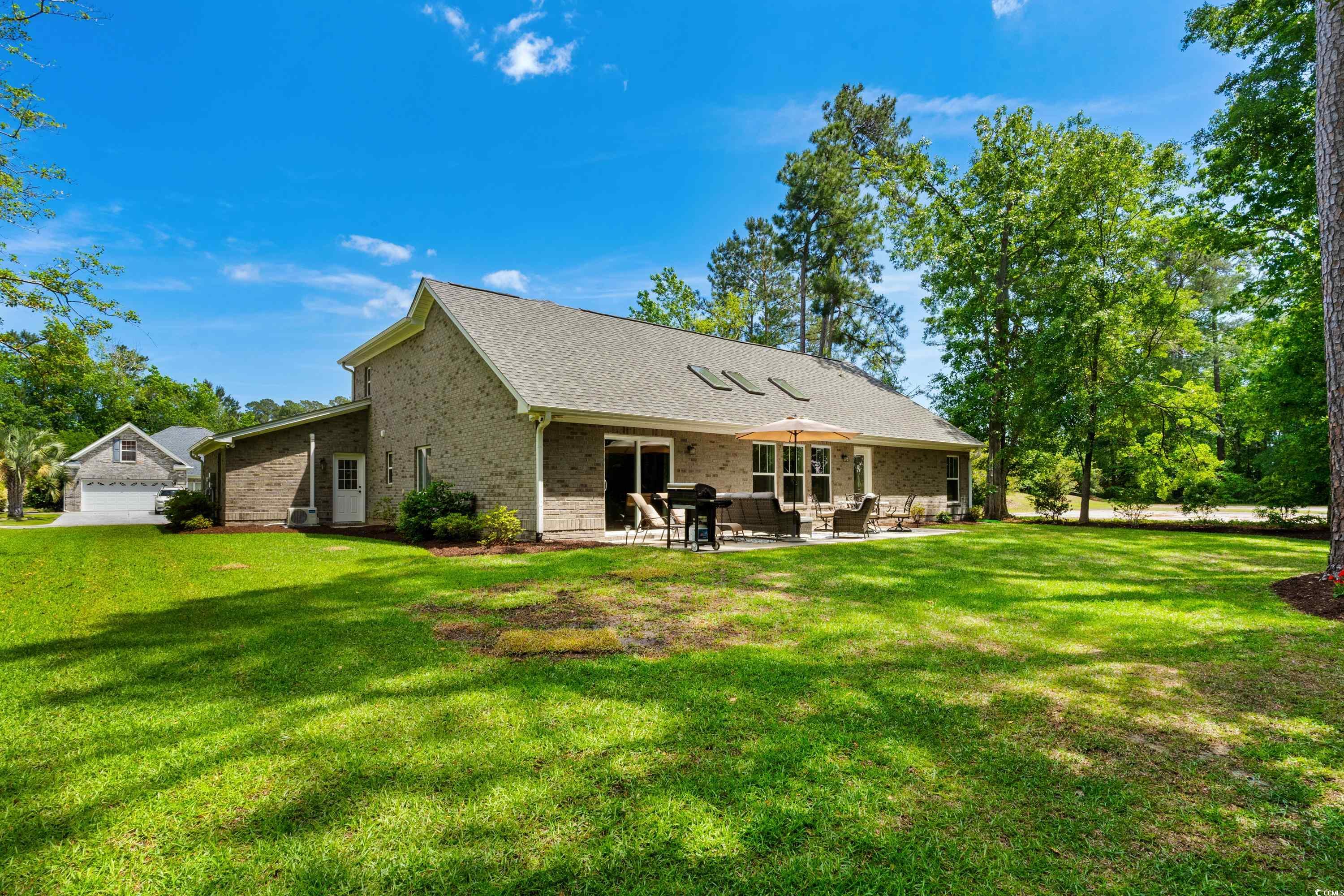 370 Foxtail Drive Longs, SC 29568 - Photo 20 of 40 Back of property featuring a yard, a patio, an out