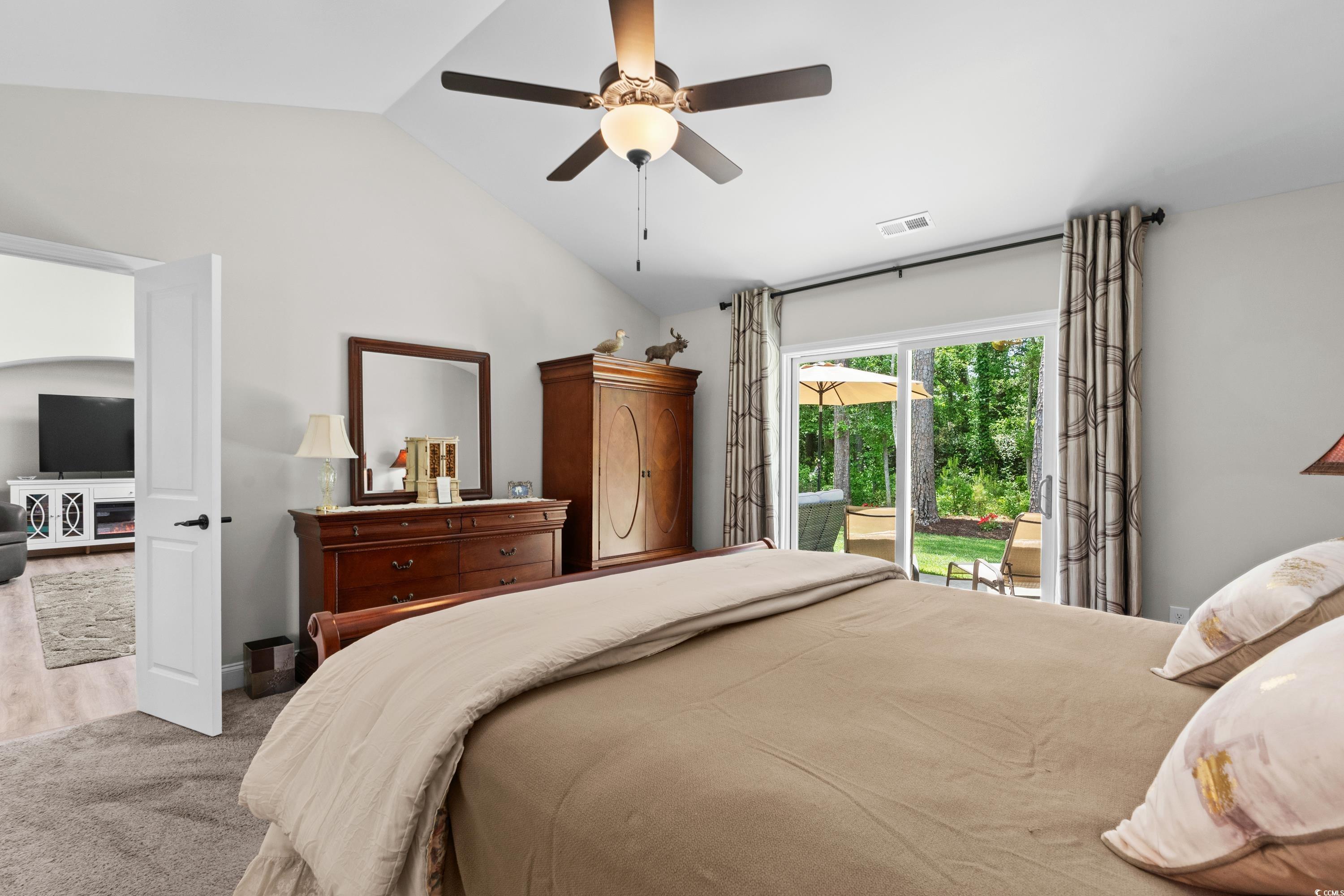 370 Foxtail Drive Longs, SC 29568 - Photo 24 of 40 Carpeted bedroom with vaulted ceiling, a ceiling f