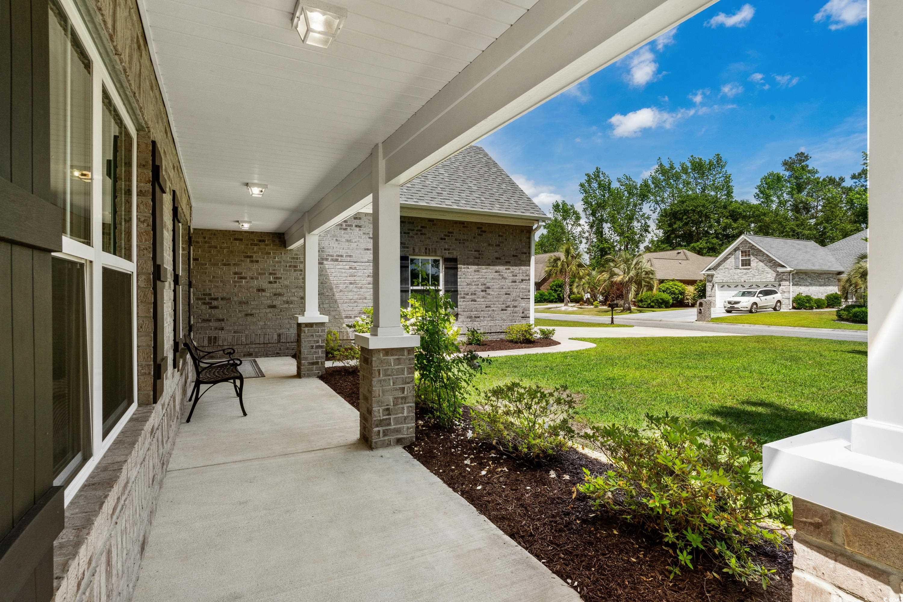 370 Foxtail Drive Longs, SC 29568 - Photo 3 of 40 View of patio featuring a porch
