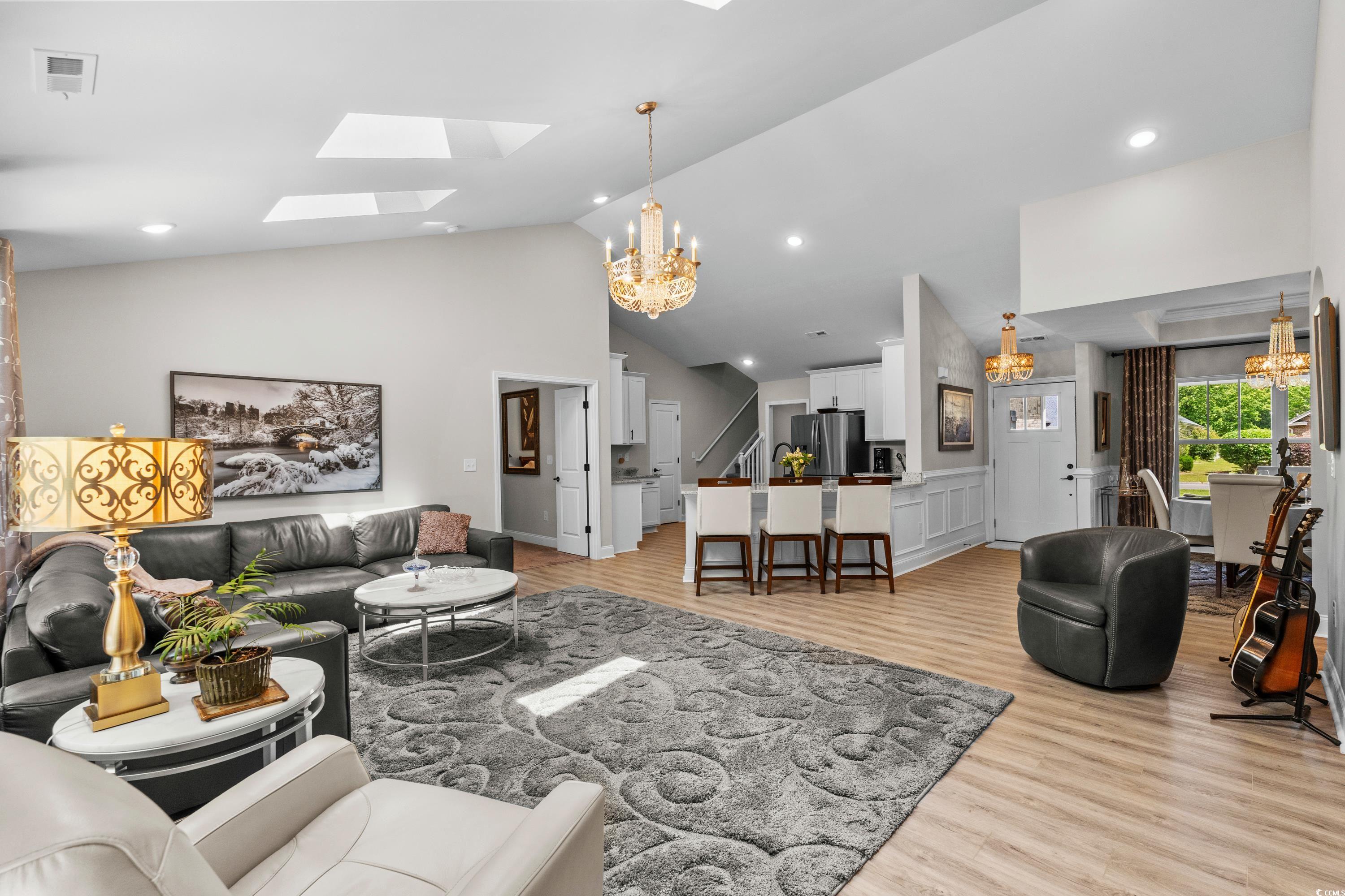 370 Foxtail Drive Longs, SC 29568 - Photo 7 of 40 Living area featuring a skylight, high vaulted cei